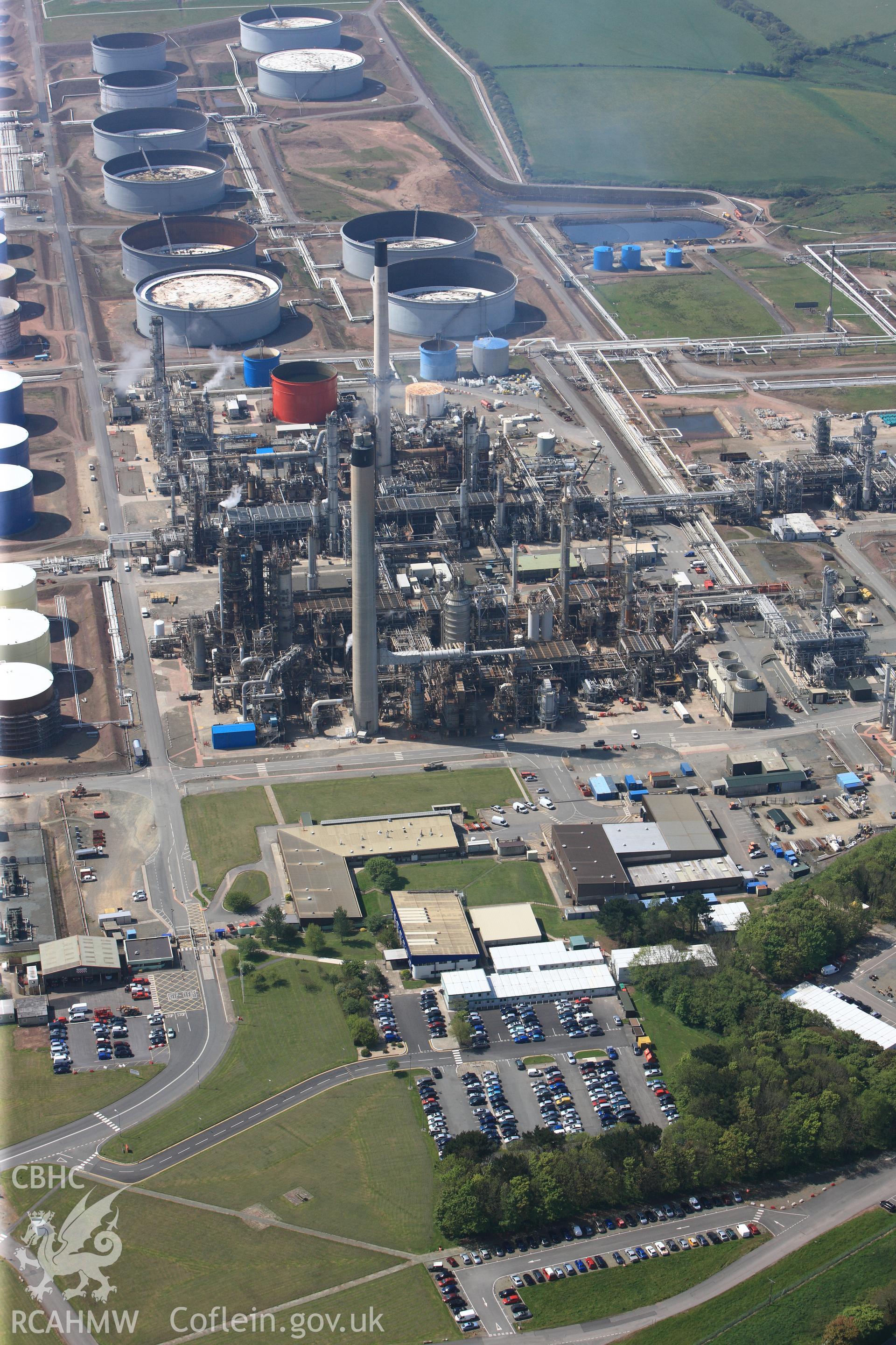RCAHMW colour oblique photograph of General view of Amoco oil refinery, looking south west. Taken by Toby Driver on 24/05/2012.