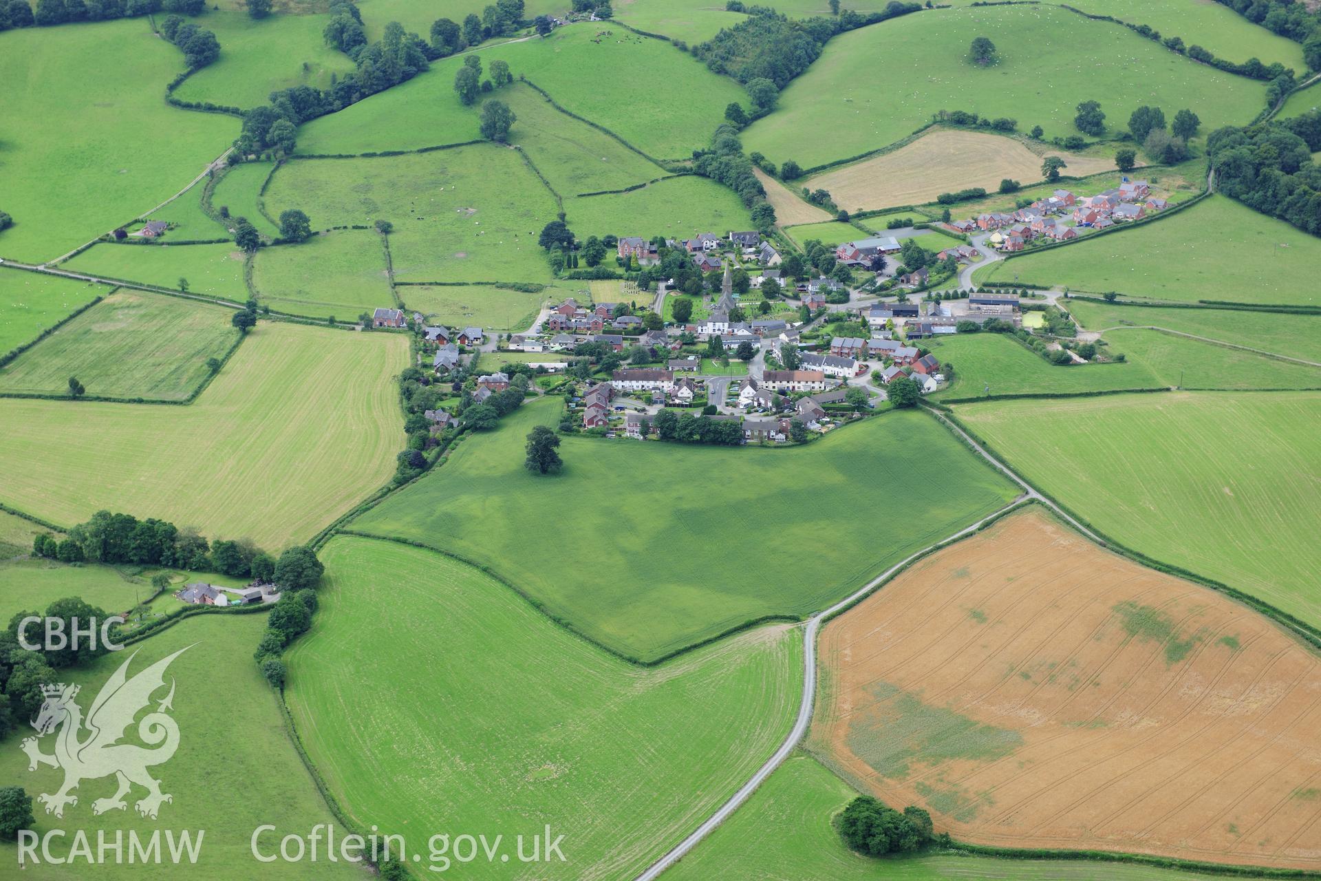 RCAHMW colour oblique photograph of Castle Caereinion village. Taken by Toby Driver on 27/07/2012.