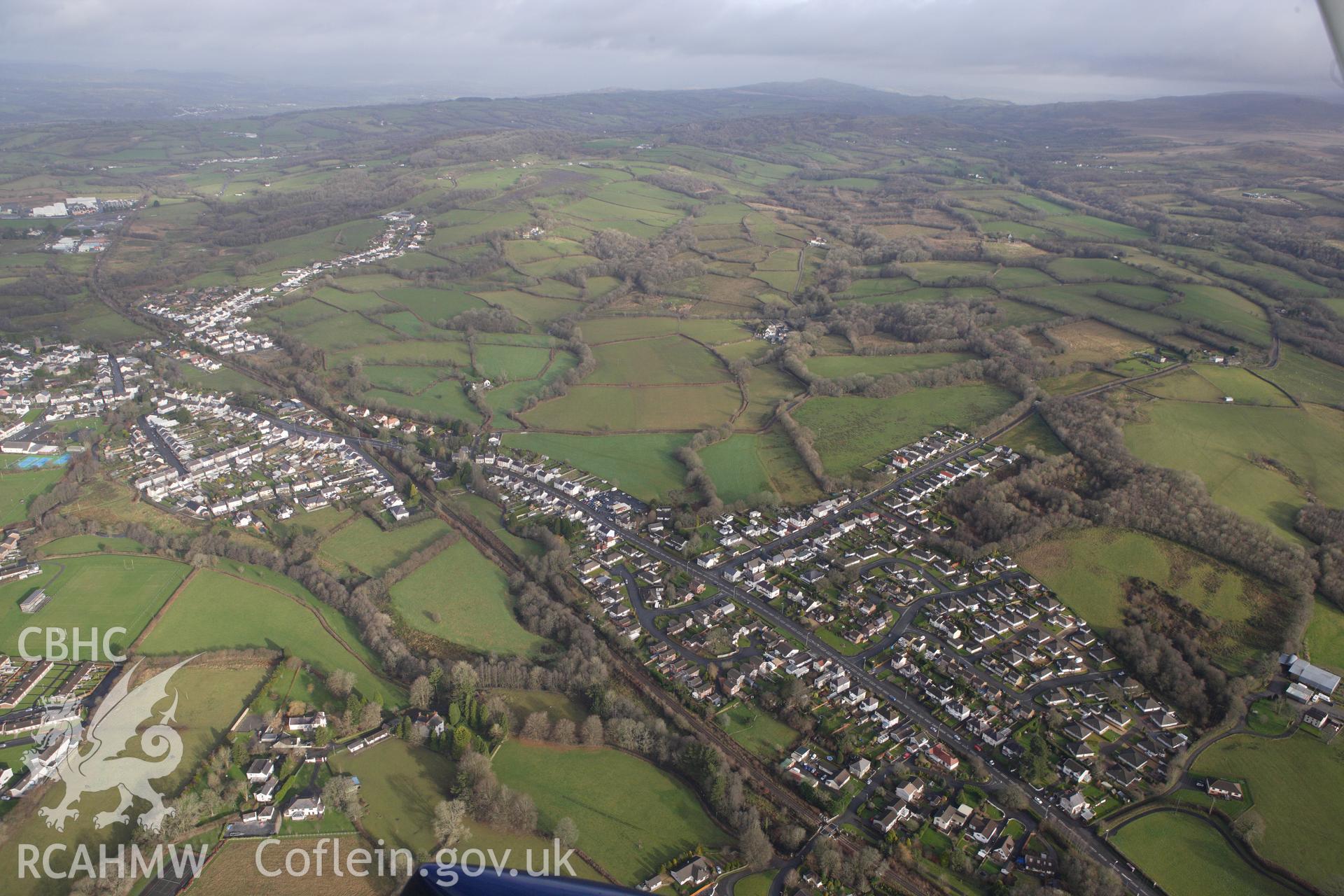 RCAHMW colour oblique photograph of Llandybie village, view from the south. Taken by Toby Driver on 27/01/2012.