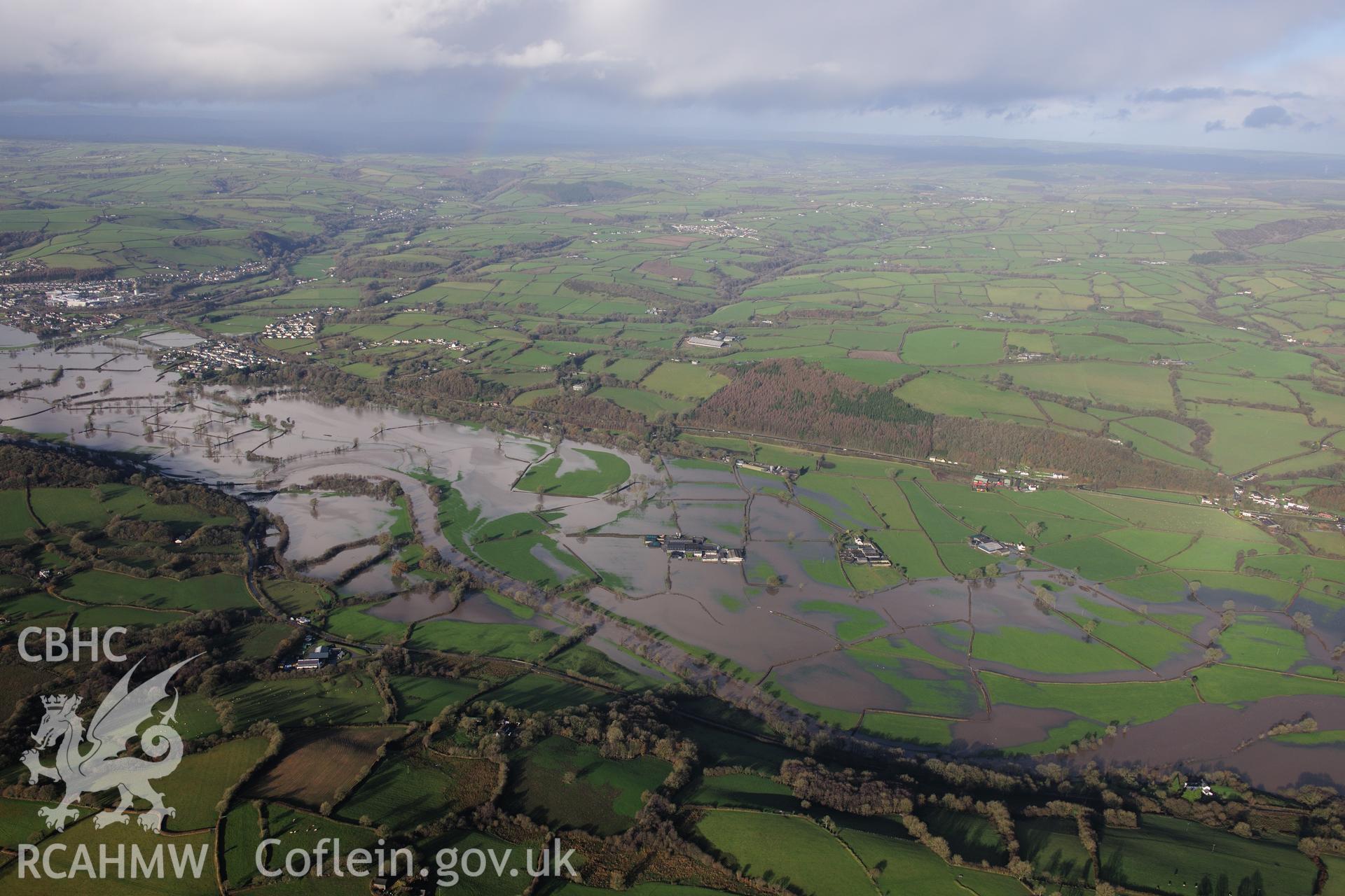 RCAHMW colour oblique photograph of River Tywi at Glantowy Fawr farm, wide view with flooding, from south-west. Taken by Toby Driver on 23/11/2012.