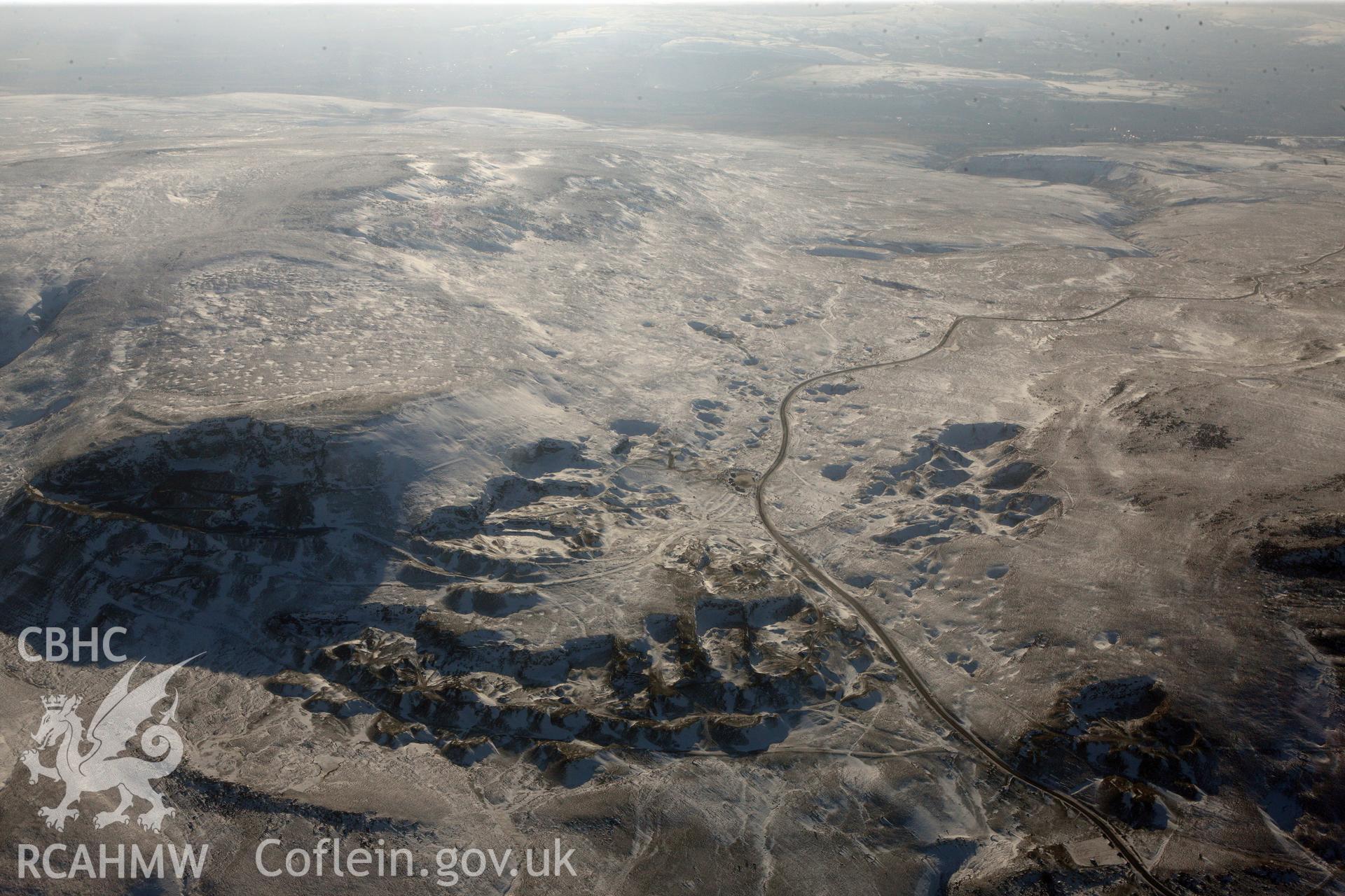 RCAHMW colour oblique photograph of Long View of Foel Fawr Quarry Complex. Taken by Toby Driver on 02/02/2012.
