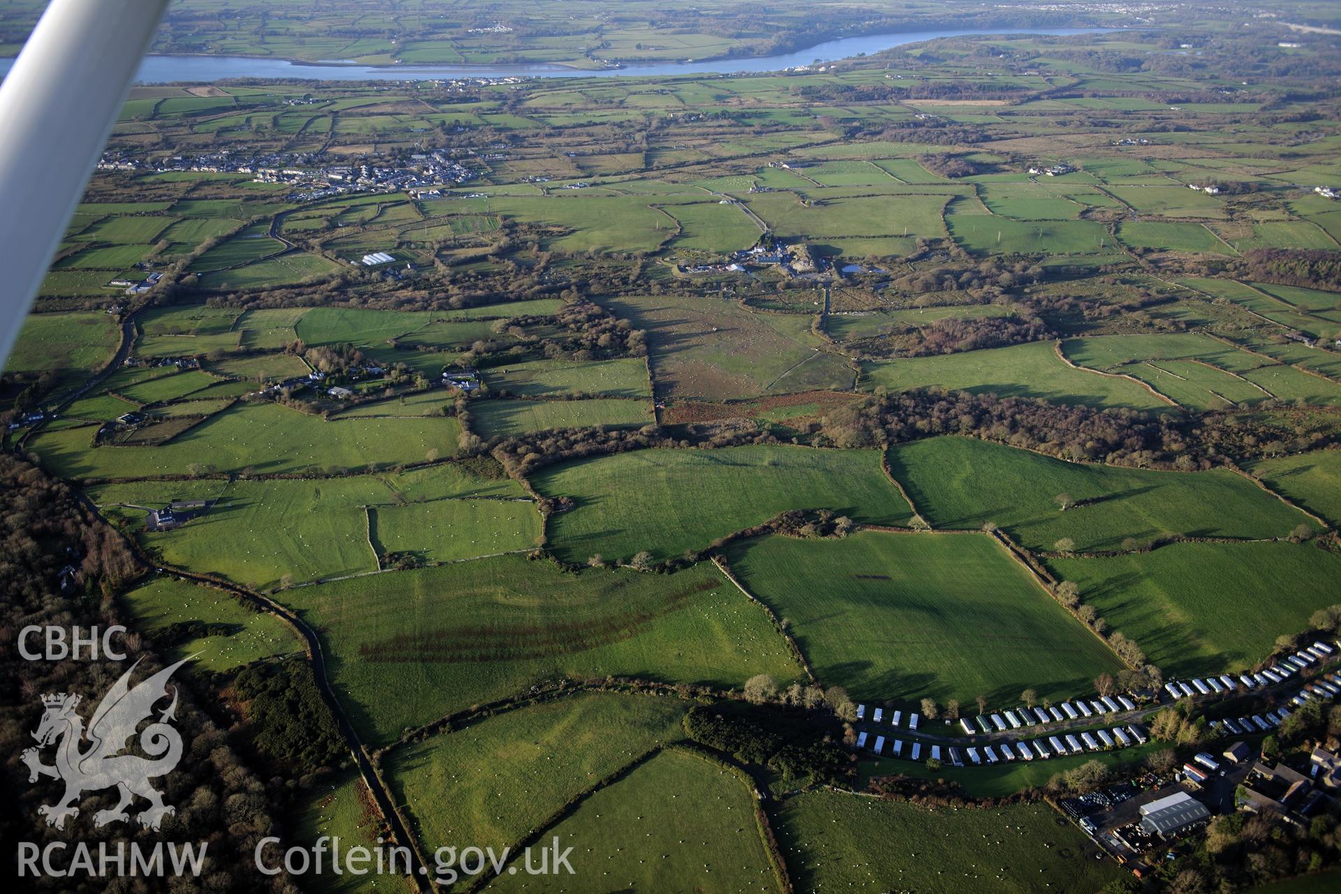 RCAHMW colour oblique photograph of Pen y Gaer settlements and field systems, looking north-west. Taken by Toby Driver on 10/12/2012.