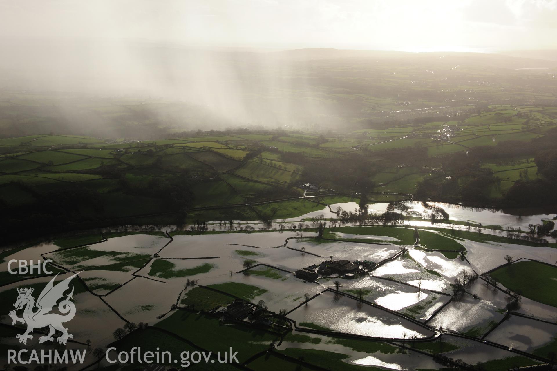 RCAHMW colour oblique photograph of Glantowy Fawr farm, with flooding, view from north. Taken by Toby Driver on 23/11/2012.