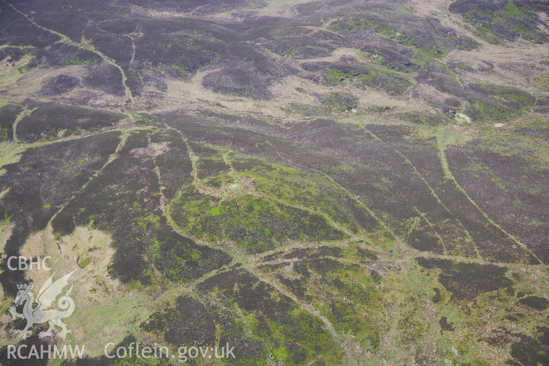 RCAHMW colour oblique photograph of Carreg Bica Round Cairn. Taken by Toby Driver on 28/05/2012.