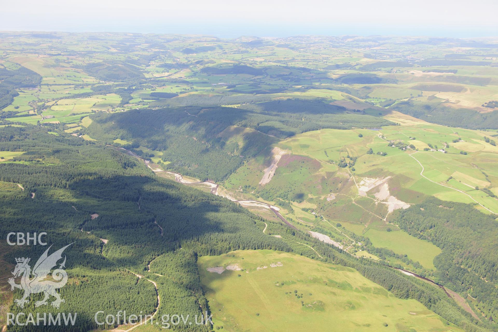 RCAHMW colour oblique photograph of Cwmystwyth leadmines and Geufron slate quarry (in foreground), looking north-west. Taken by Toby Driver on 10/08/2012.