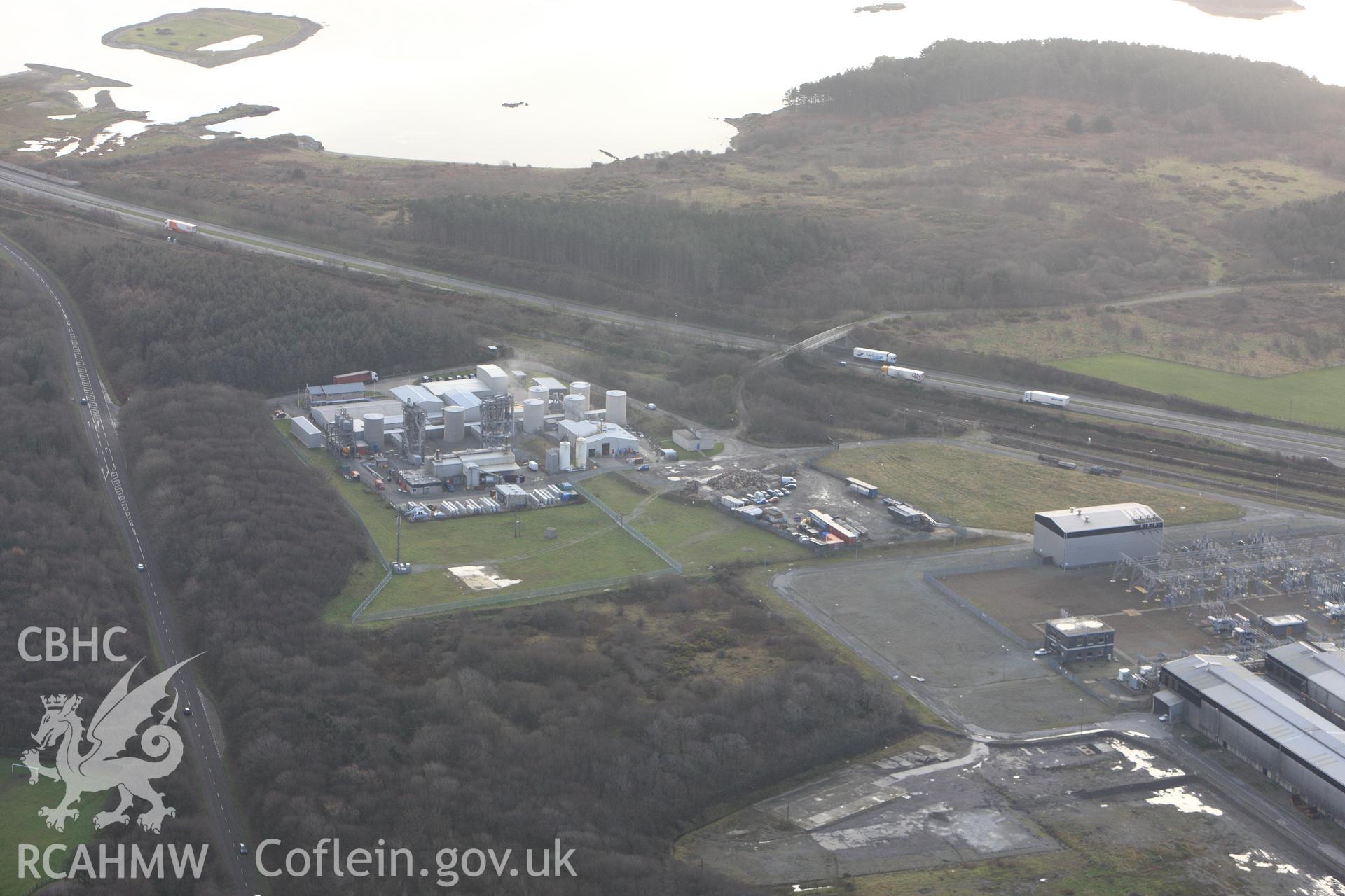 RCAHMW colour oblique photograph of Anglesey Aluminium Smelting Works, aerial survey prior to closure. Taken by Toby Driver on 13/01/2012.