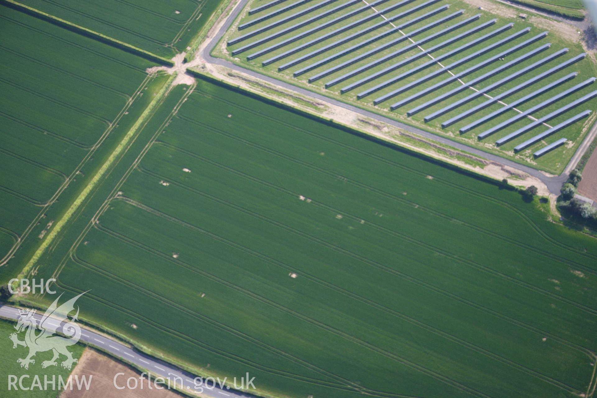 RCAHMW colour oblique photograph of Llancayo Farm Barrow Cemetery. Taken by Toby Driver on 22/05/2012.