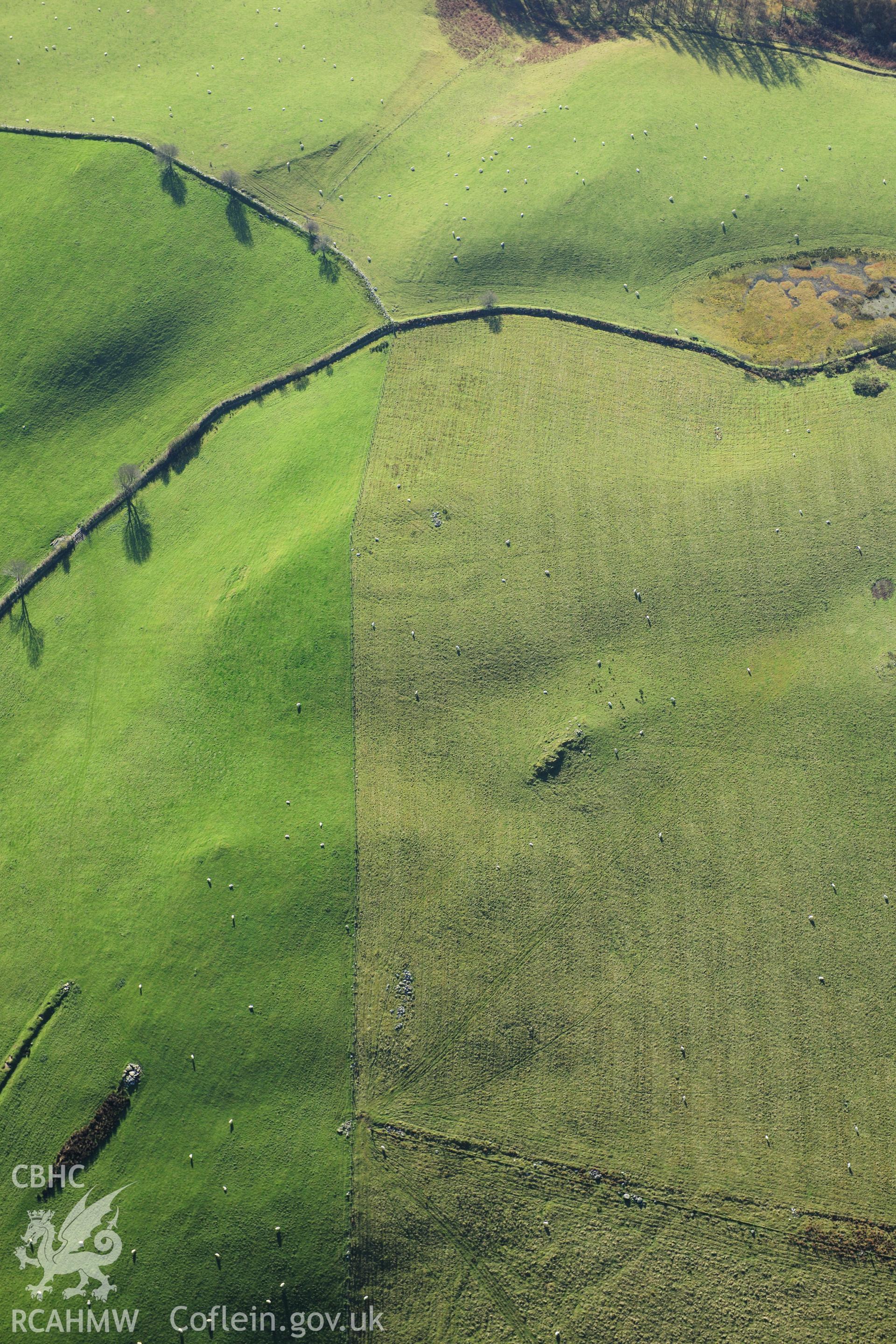 RCAHMW colour oblique photograph of Penlan square earthwork enclosure, or fortlet. Taken by Toby Driver on 05/11/2012.