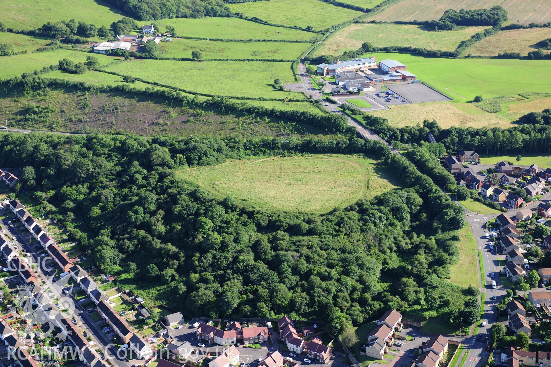 RCAHMW colour oblique photograph of Caerau Hillfort, view showing hill to west of main fort. Taken by Toby Driver on 24/07/2012.