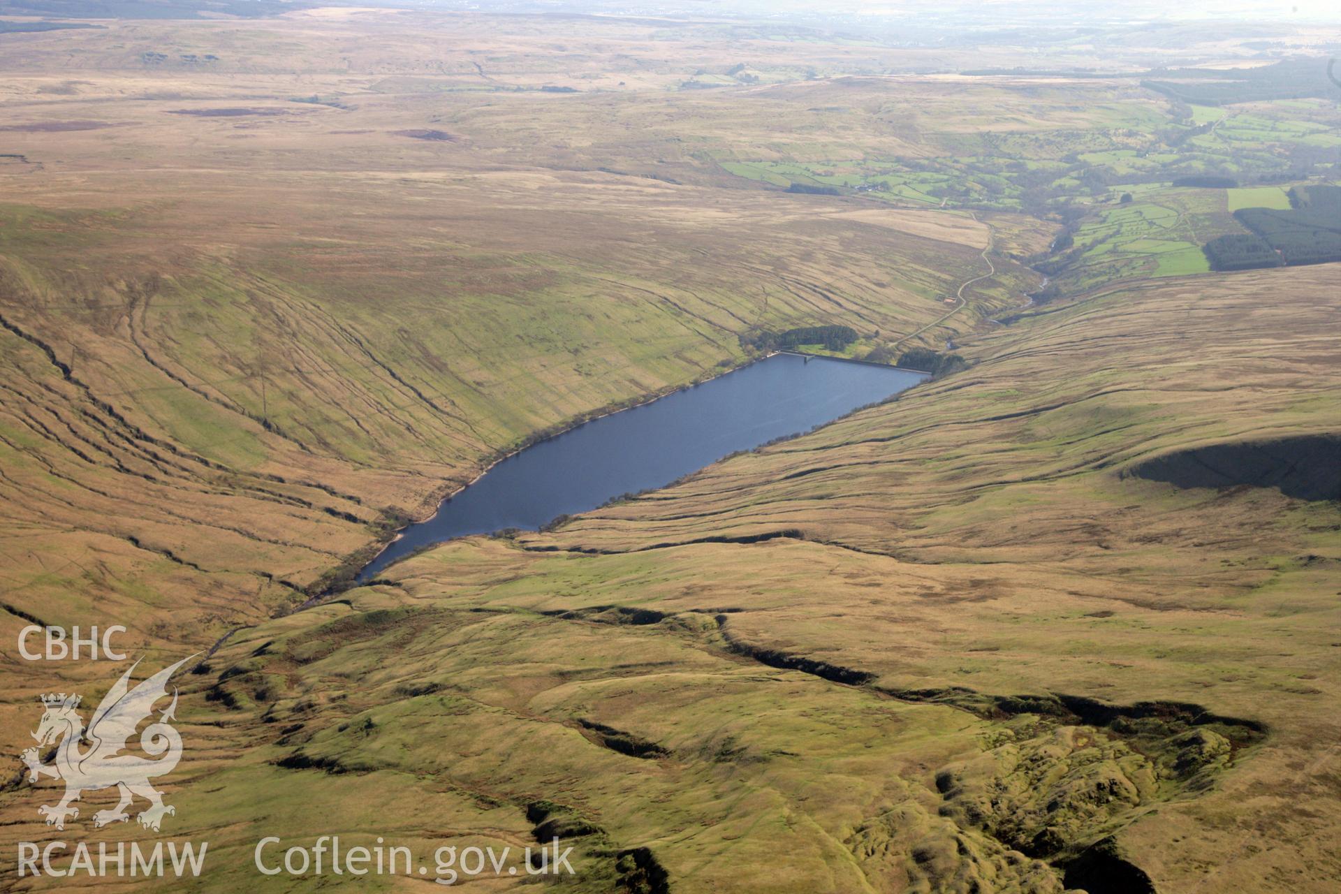 RCAHMW colour oblique photograph of Ystradfellte Reservoir, upland landscape looking south. Taken by Toby Driver and Oliver Davies on 28/03/2012.