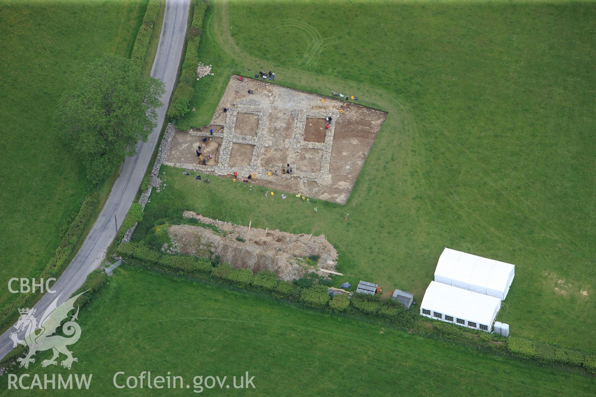 RCAHMW colour oblique photograph of Gatehouse, Strata Florida Abbey Precinct, under excavation. Taken by Toby Driver on 19/06/2012.