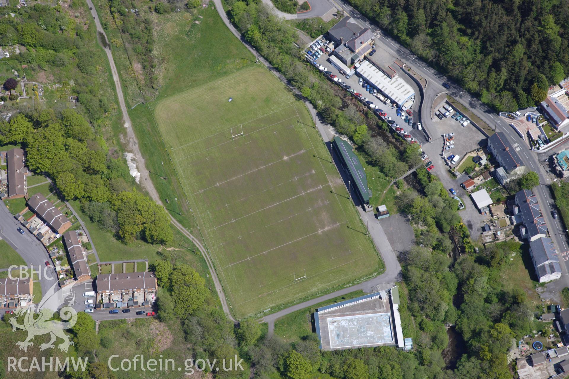 RCAHMW colour oblique photograph of Brynamman, open air swimming baths, and rugby pitch. Taken by Toby Driver on 22/05/2012.