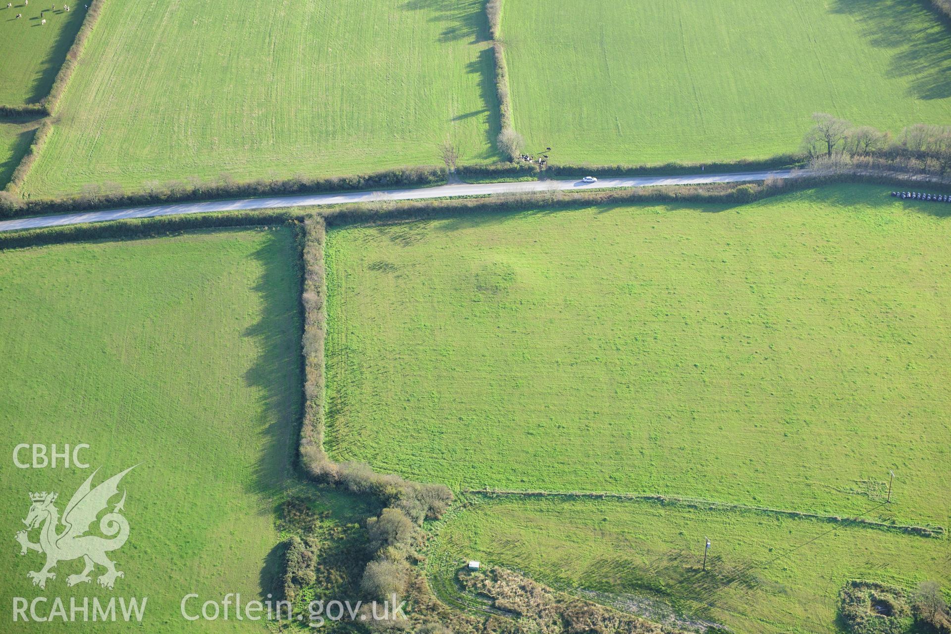 RCAHMW colour oblique photograph of New House Round Barrows. Taken by Toby Driver on 26/10/2012.