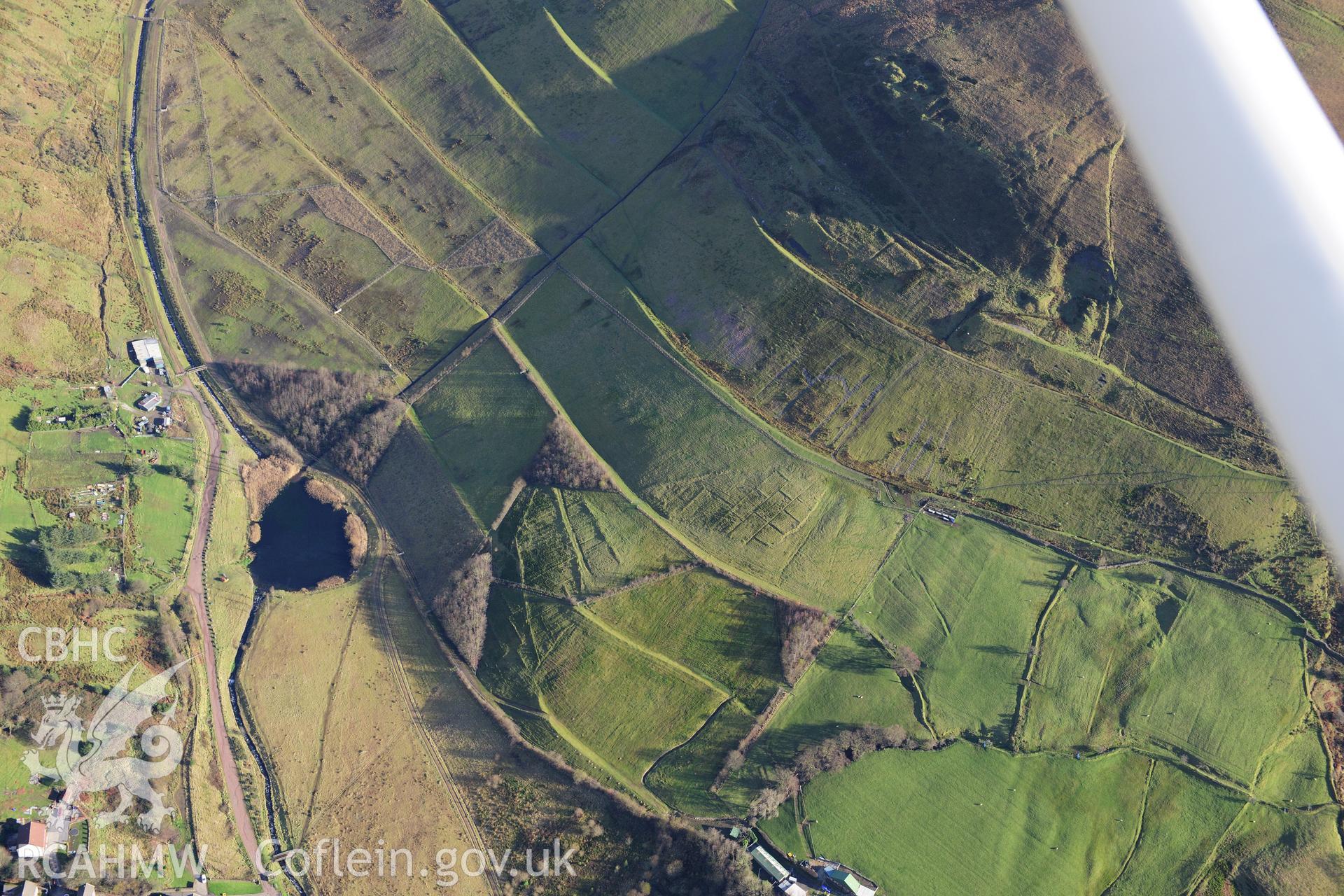 RCAHMW colour oblique photograph of Blaengarw colliery, site, with landscaped tips. Taken by Toby Driver on 28/11/2012.