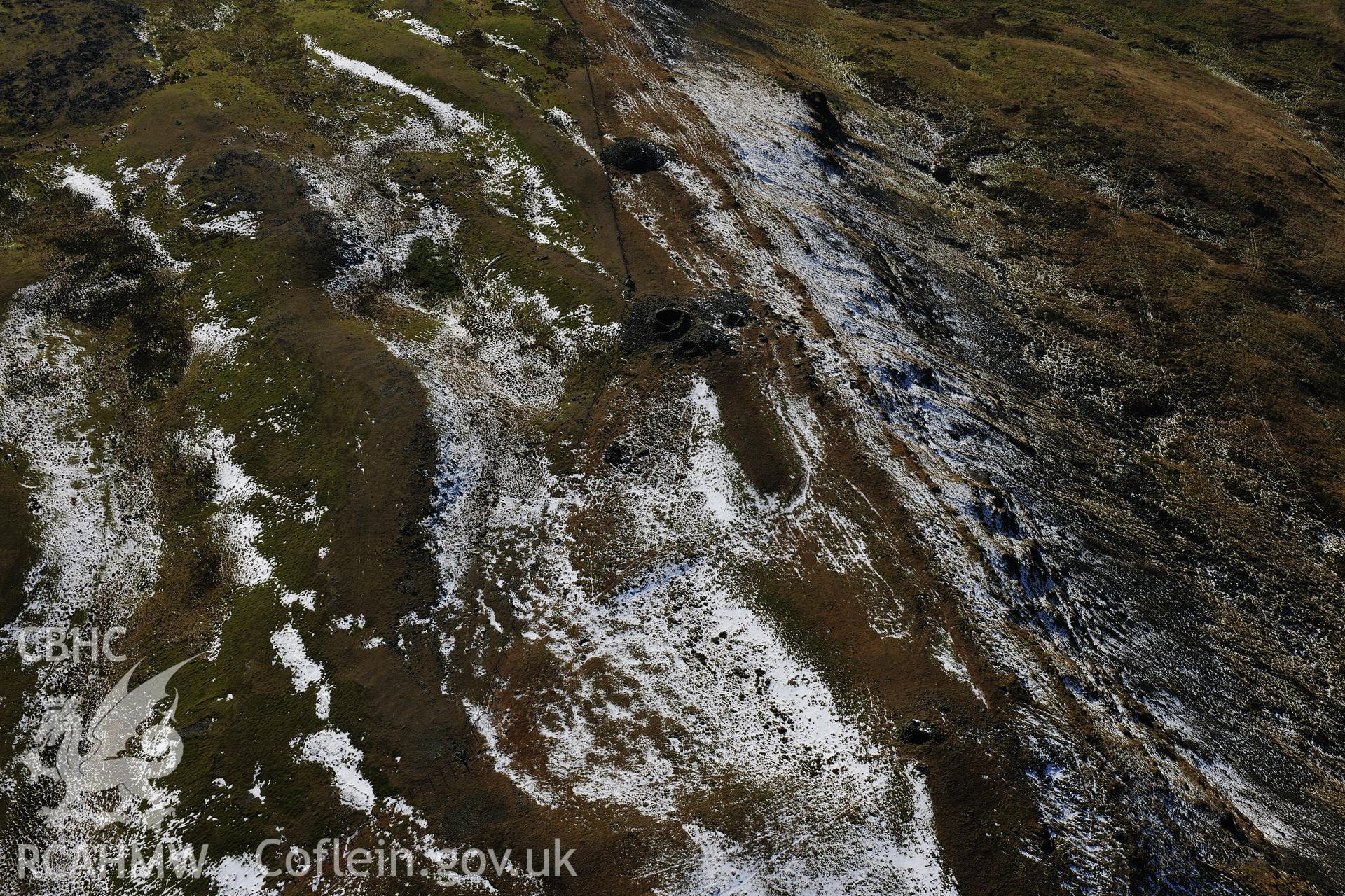 RCAHMW colour oblique photograph of Pen Plynlimon fawr, central cairn, and summit cairn cemetery, with a dusting of snow. Taken by Toby Driver on 05/11/2012.