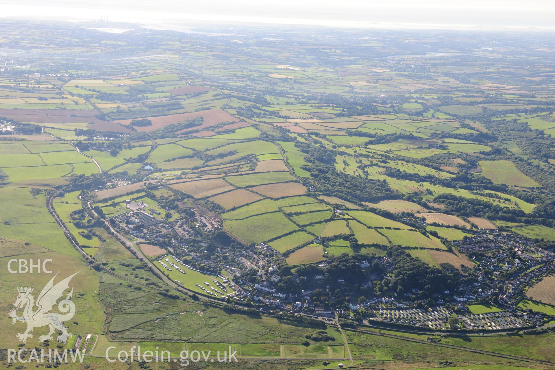 RCAHMW colour oblique photograph of Penally village, landscape from the east. Taken by Toby Driver on 24/07/2012.