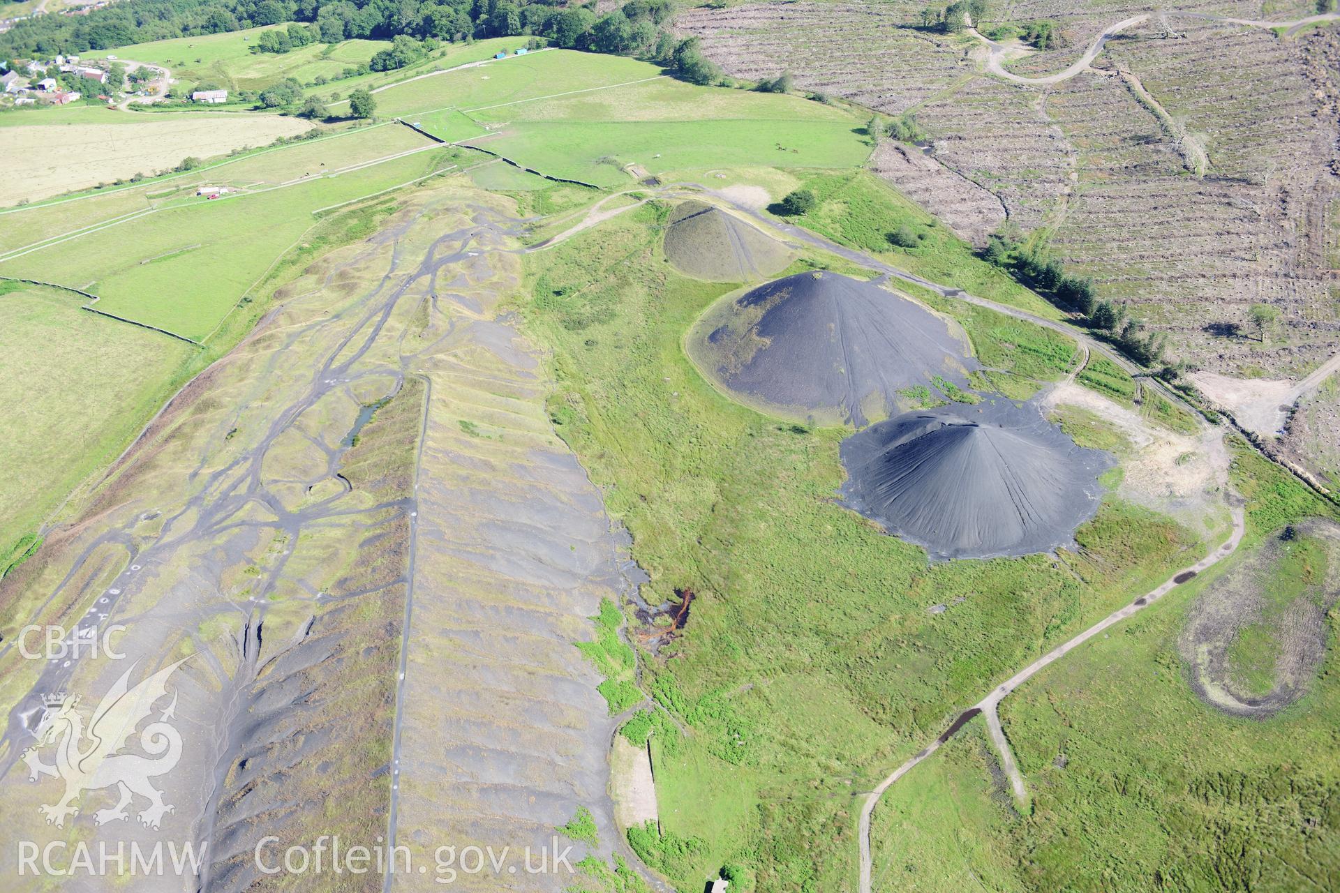 RCAHMW colour oblique photograph of Llanbradach Colliery spoil tips. Taken by Toby Driver on 24/07/2012.