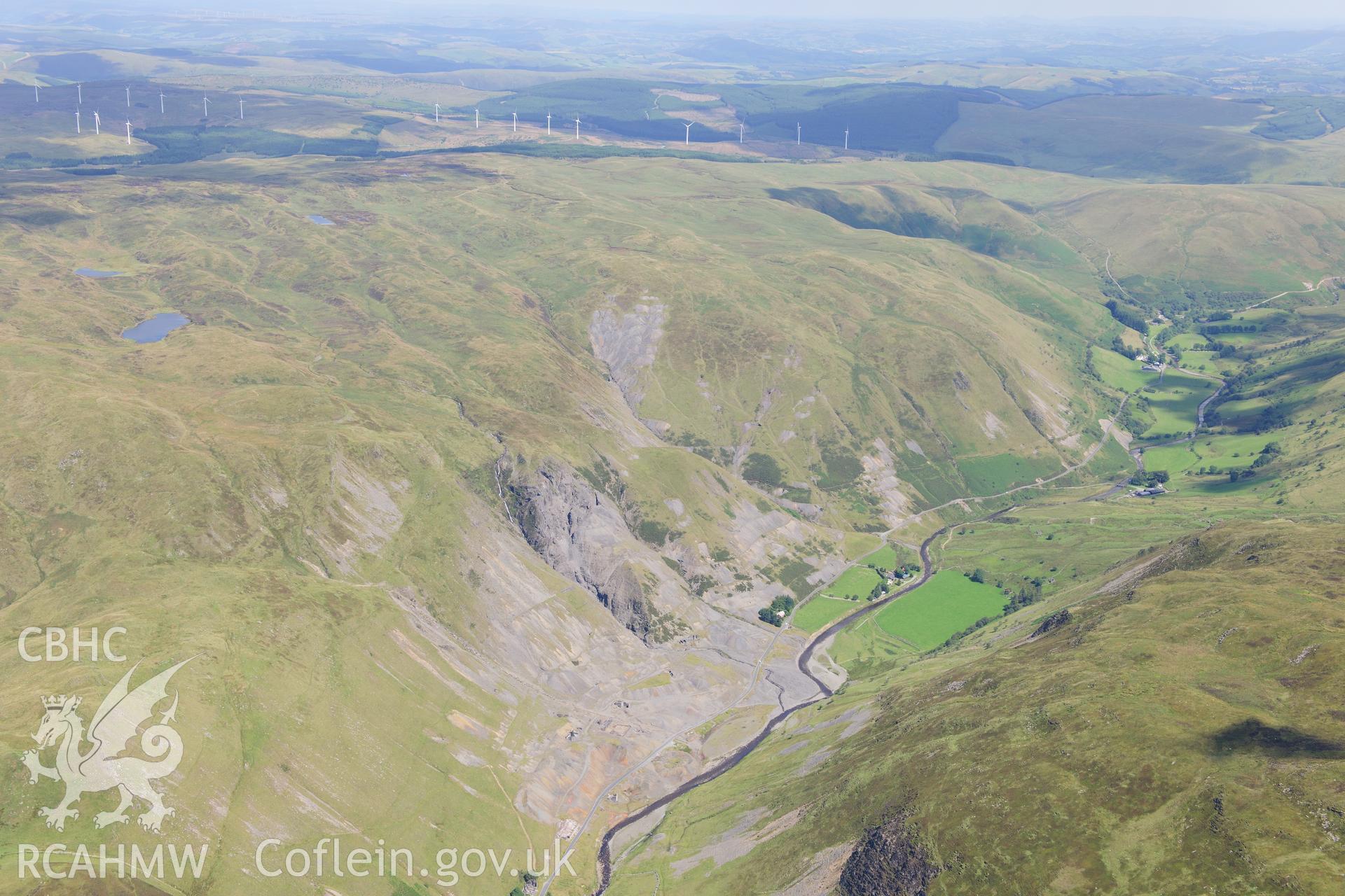 RCAHMW colour oblique photograph of South Cwmystwyth lead mine, looking north-east towards Cefn Croes Wind Farm. Taken by Toby Driver on 10/08/2012.