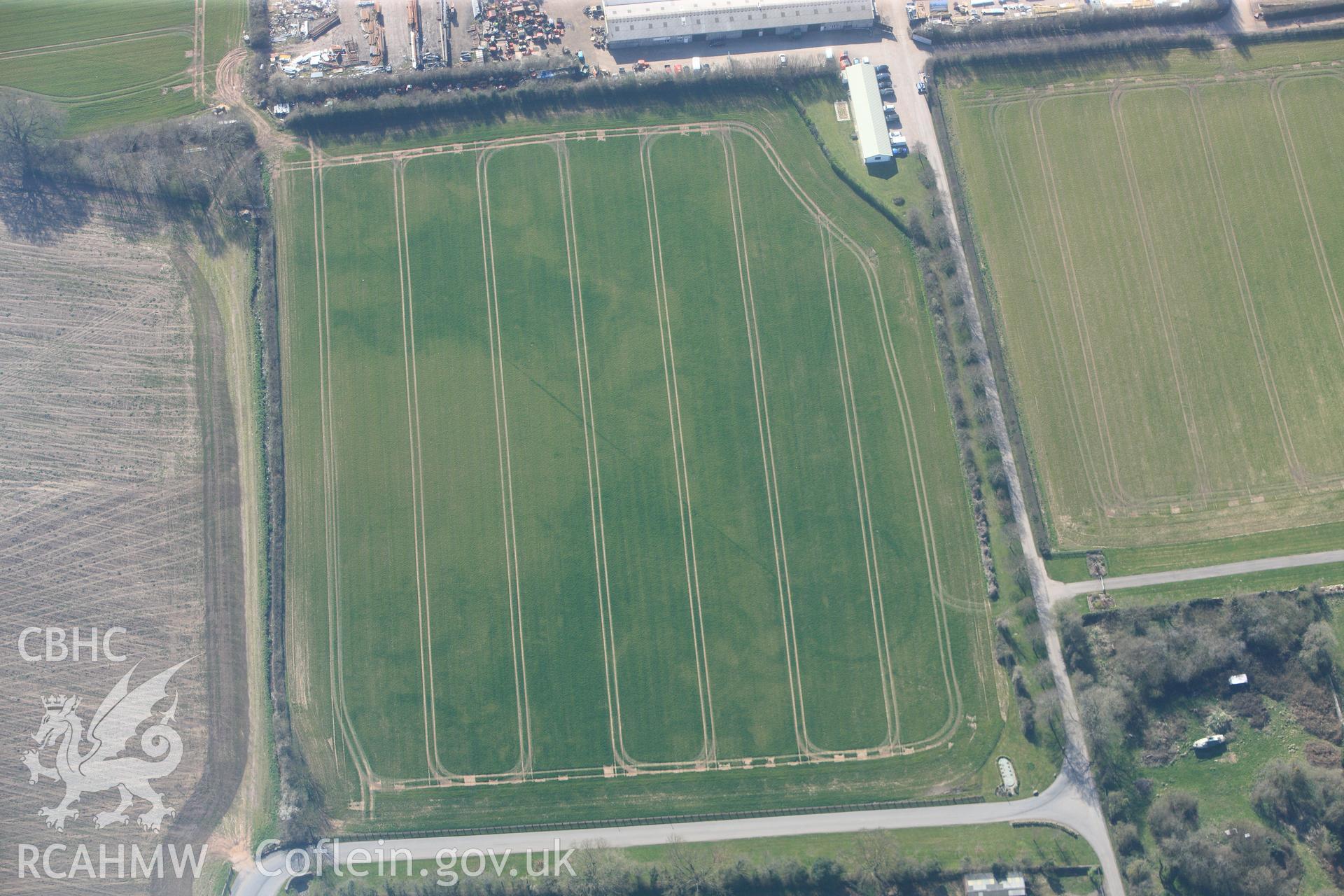 RCAHMW colour oblique photograph of Llancayo Farm barrow cemetery, southern cluster. Taken by Toby Driver and Oliver Davies on 28/03/2012.