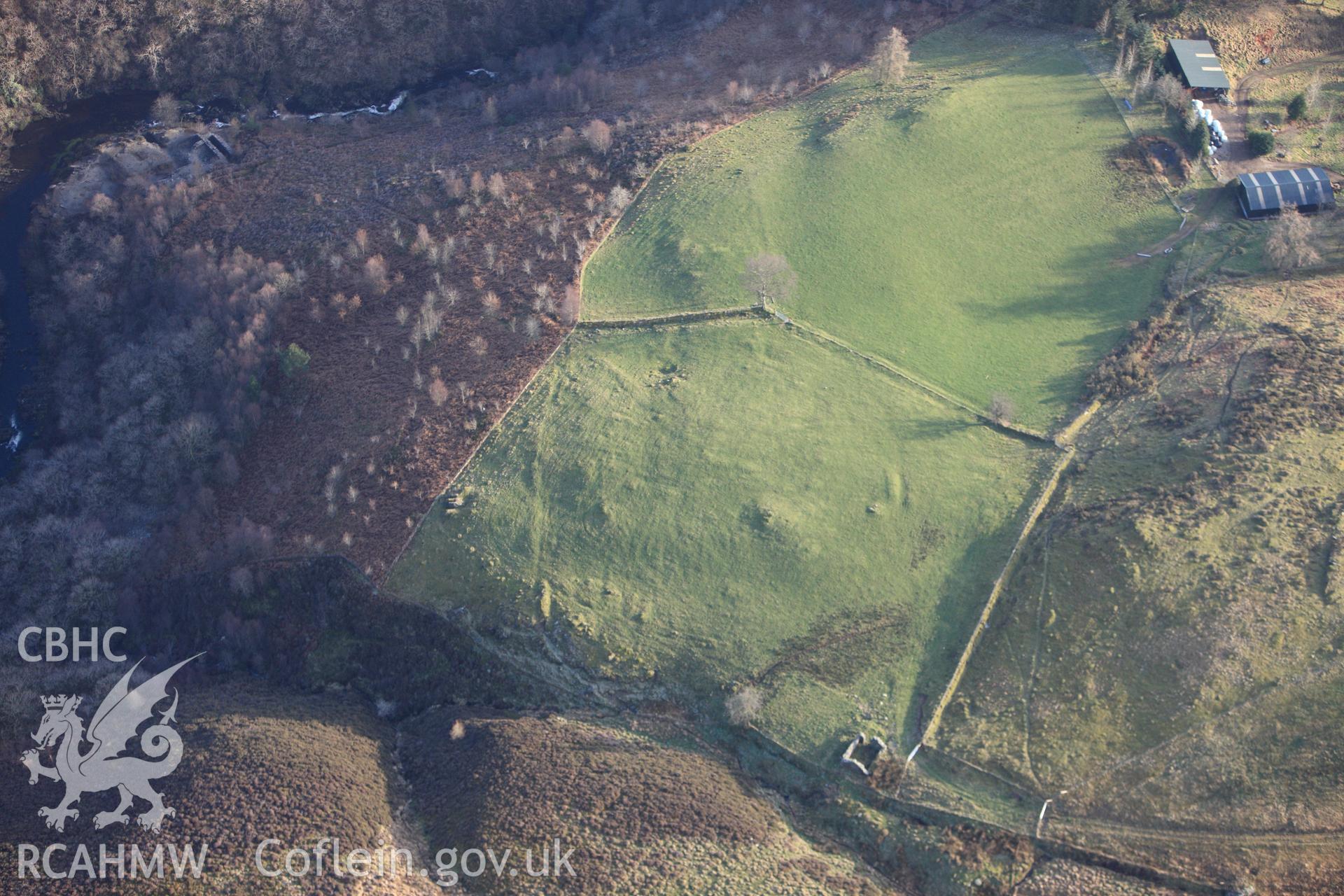 RCAHMW colour oblique photograph of Temple Lead Mine, sundry earthworks on hillside above. Taken by Toby Driver on 07/02/2012.