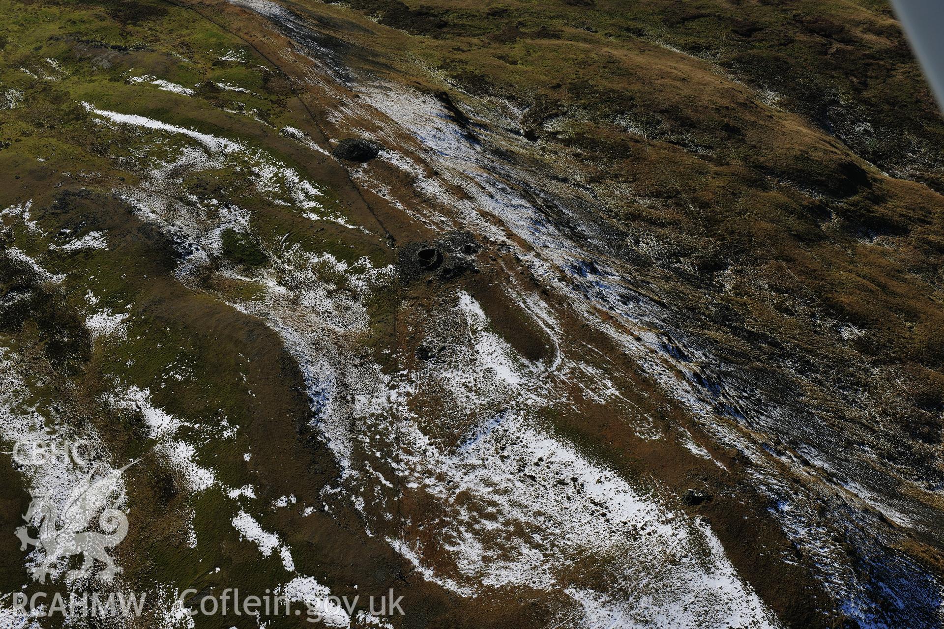 RCAHMW colour oblique photograph of Pen Plynlimon fawr, central cairn, and summit cairn cemetery, with a dusting of snow. Taken by Toby Driver on 05/11/2012.