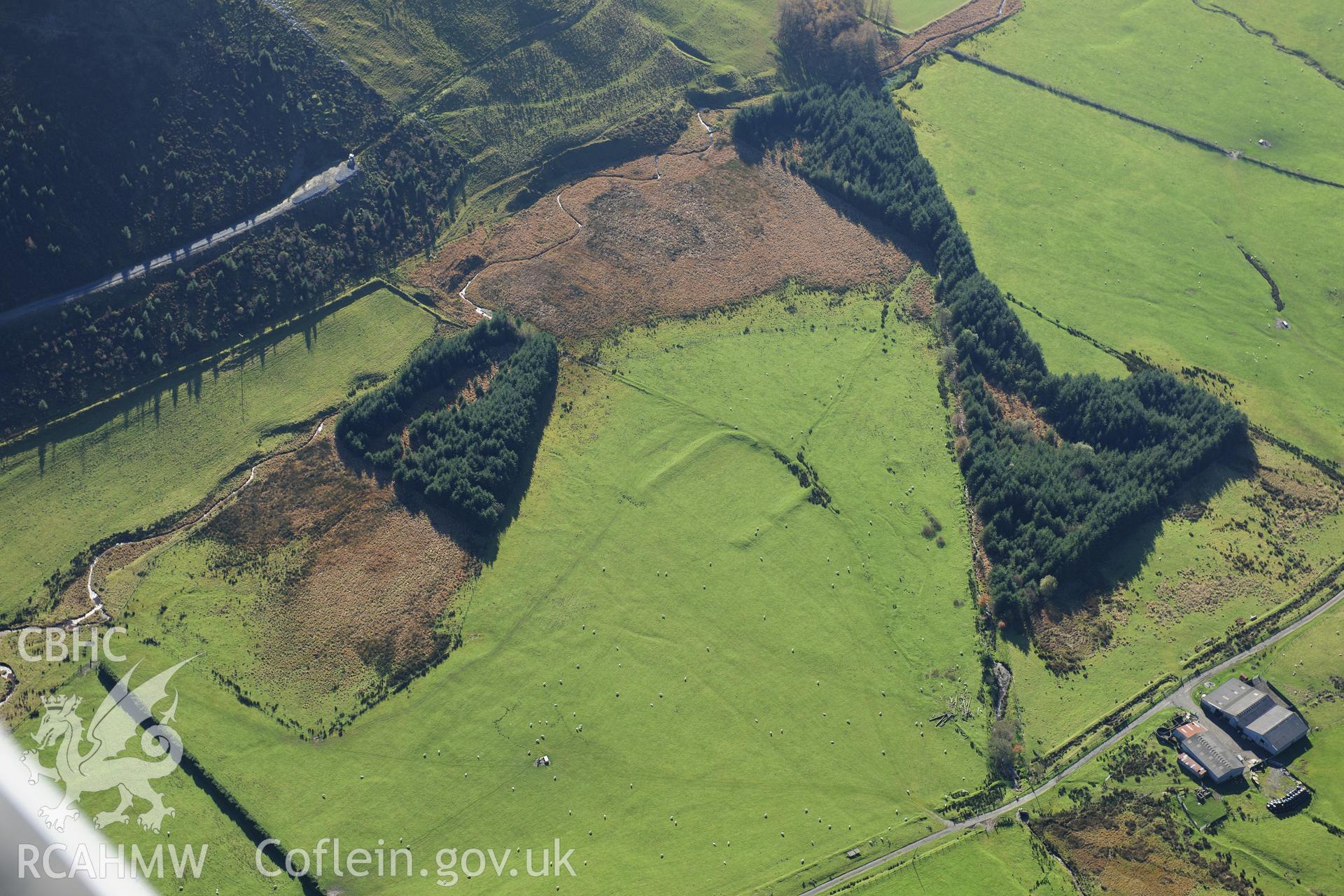 RCAHMW colour oblique photograph of Llys Arthur, defended enclosure. Taken by Toby Driver on 05/11/2012.