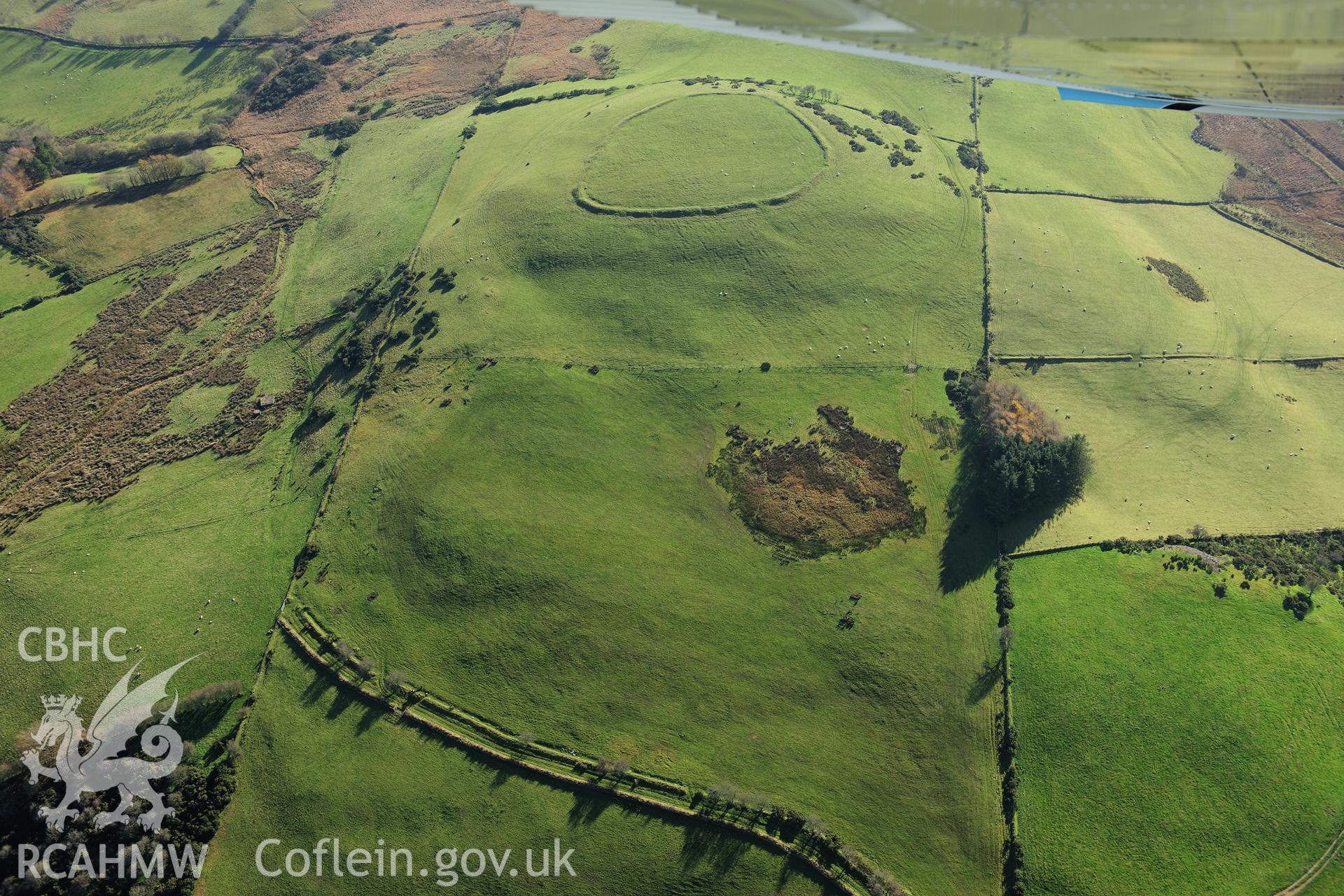 RCAHMW colour oblique photograph of Caer Pencarreg hillfort, landscape view from north-west. Taken by Toby Driver on 05/11/2012.