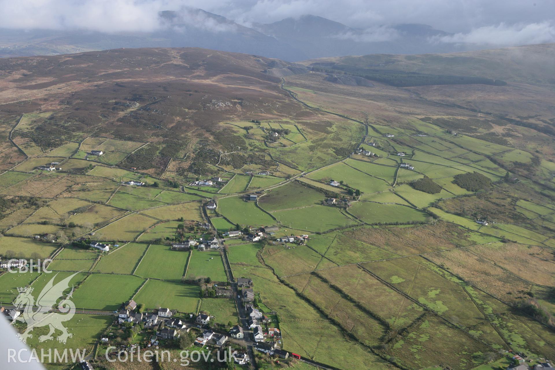 RCAHMW colour oblique photograph of Groeslan, landscape from west. Taken by Toby Driver on 13/01/2012.