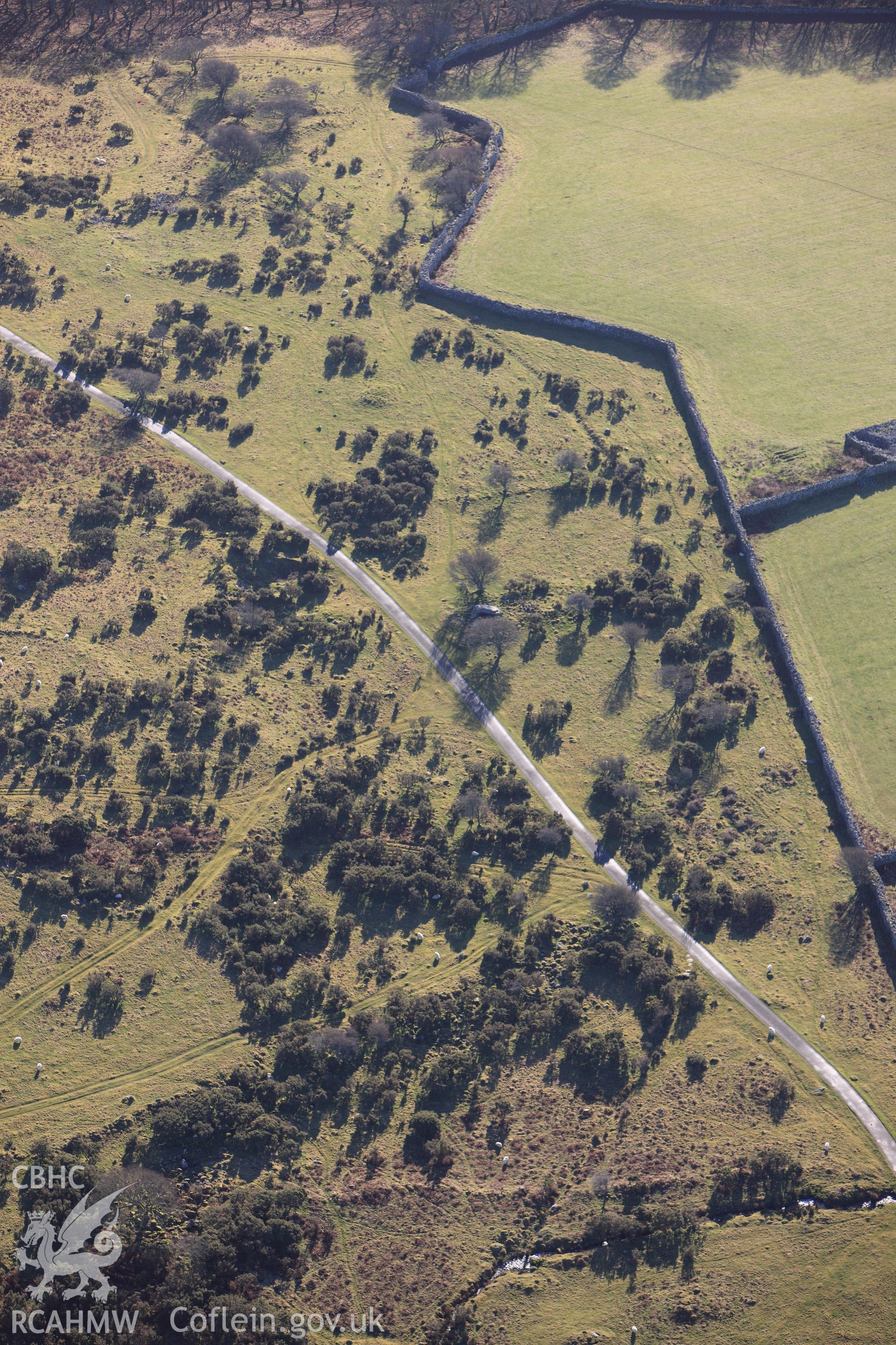 RCAHMW colour oblique photograph of Cors y Gedol burial chamber. Taken by Toby Driver on 10/12/2012.