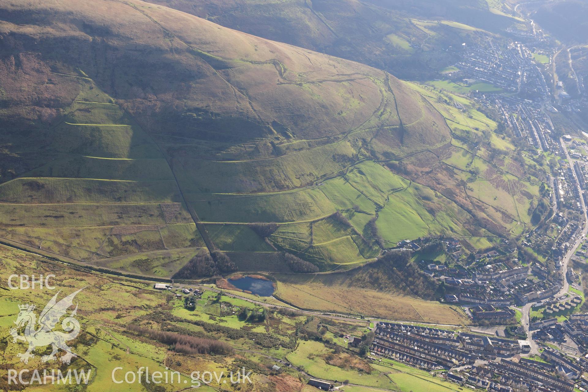 RCAHMW colour oblique photograph of Blaengarw colliery, site, with landscaped tips. Taken by Toby Driver on 28/11/2012.