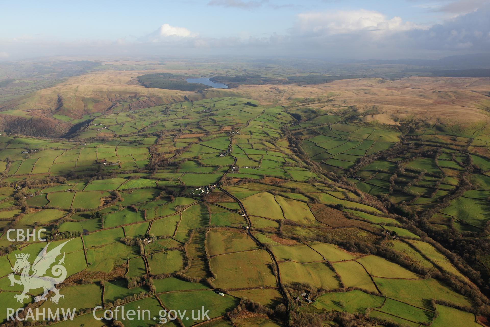 RCAHMW colour oblique photograph of Talsarn, wide landscape view from west towards Usk Reservoir. Taken by Toby Driver on 23/11/2012.