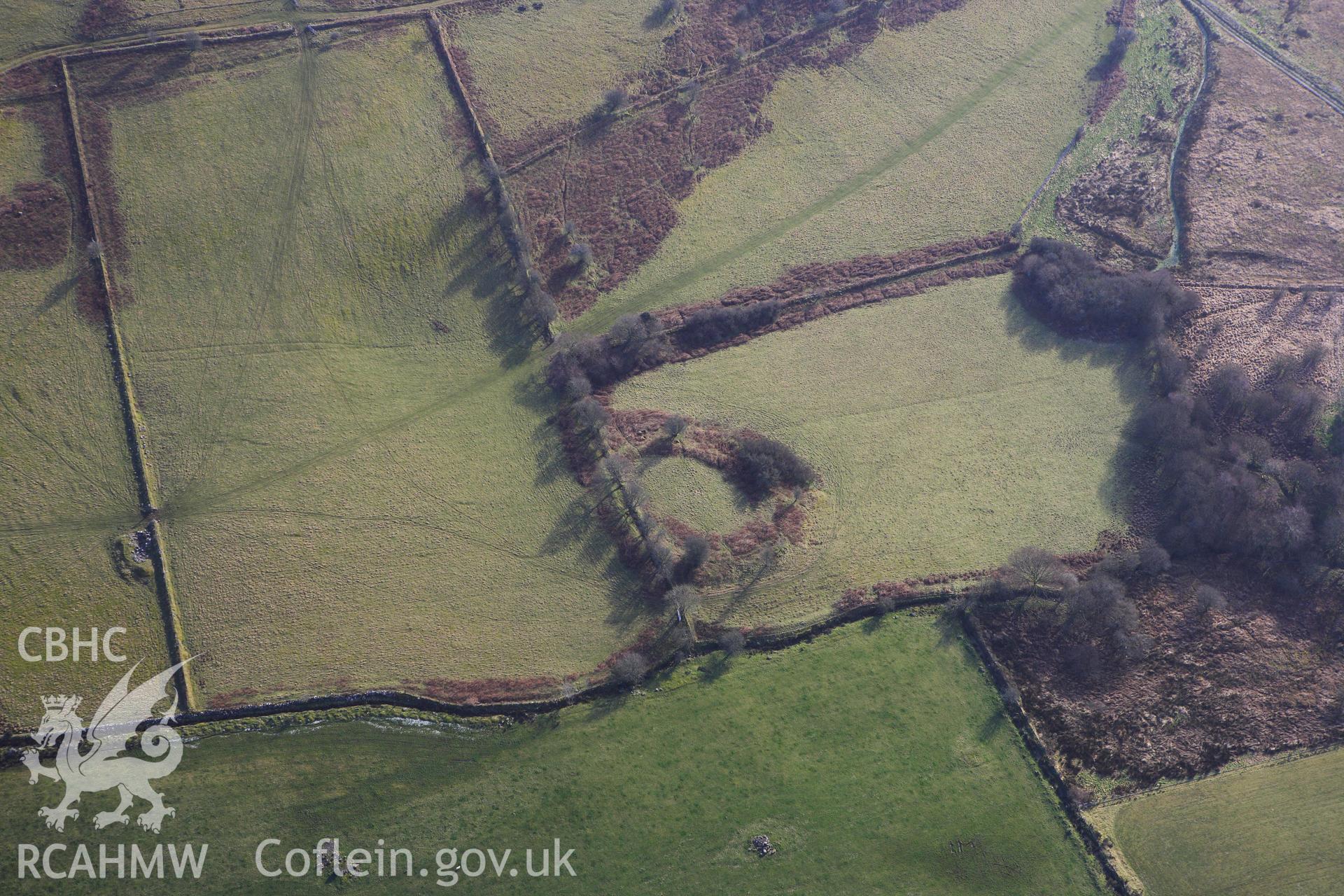 RCAHMW colour oblique photograph of Garreg Lwyd, defended enclosure. Taken by Toby Driver on 07/02/2012.