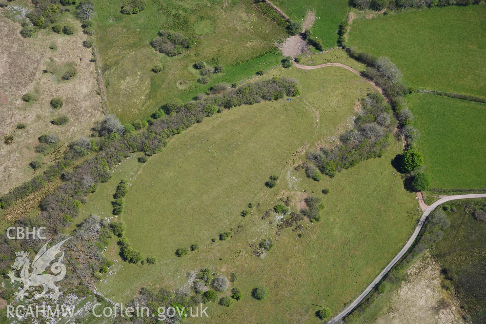RCAHMW colour oblique photograph of Pwll-y-rhyd, possible hillfort. Taken by Toby Driver on 22/05/2012.