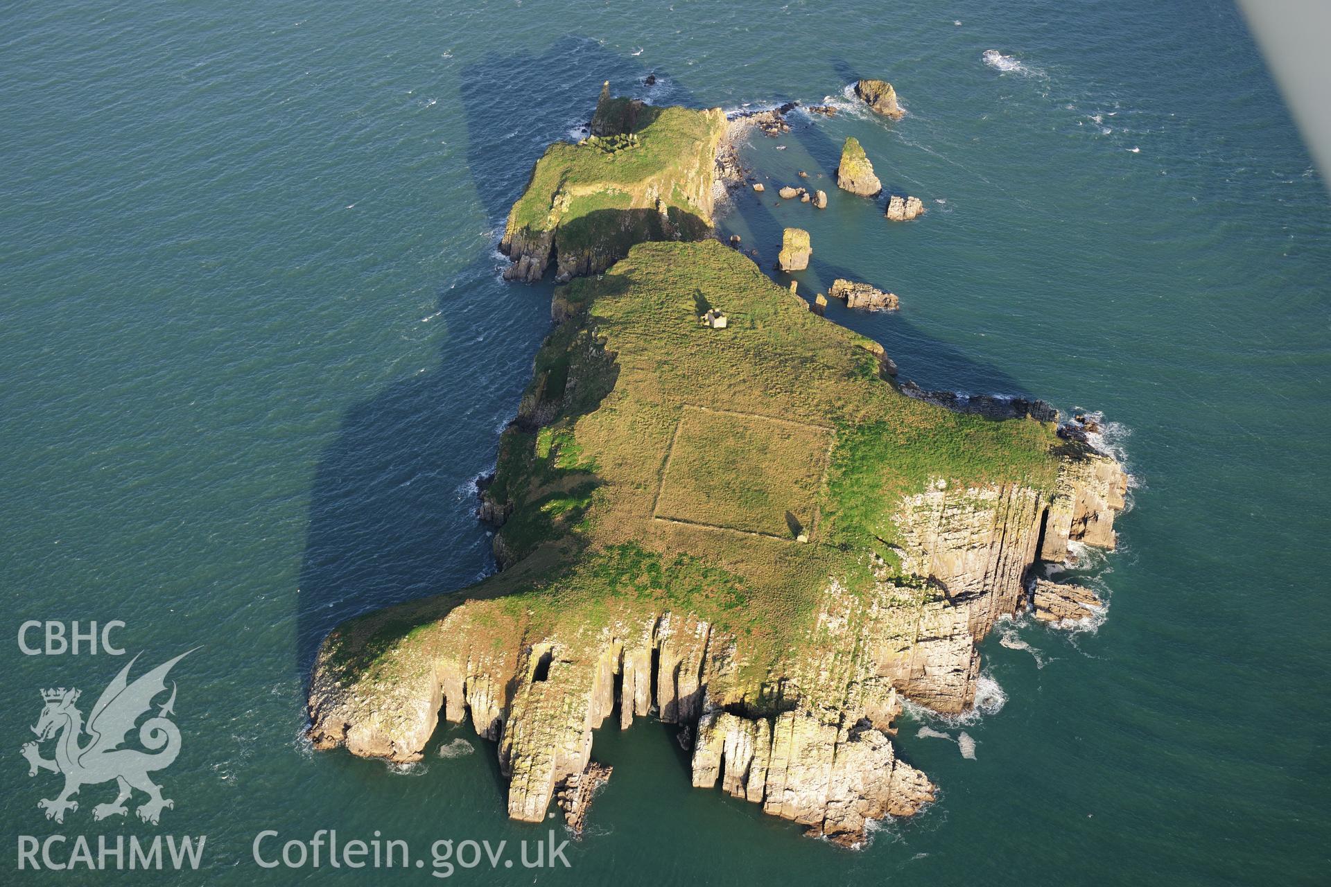 RCAHMW colour oblique photograph of Chapel ruins and field enclosure, St Margaret's Island. Taken by Toby Driver on 26/10/2012.