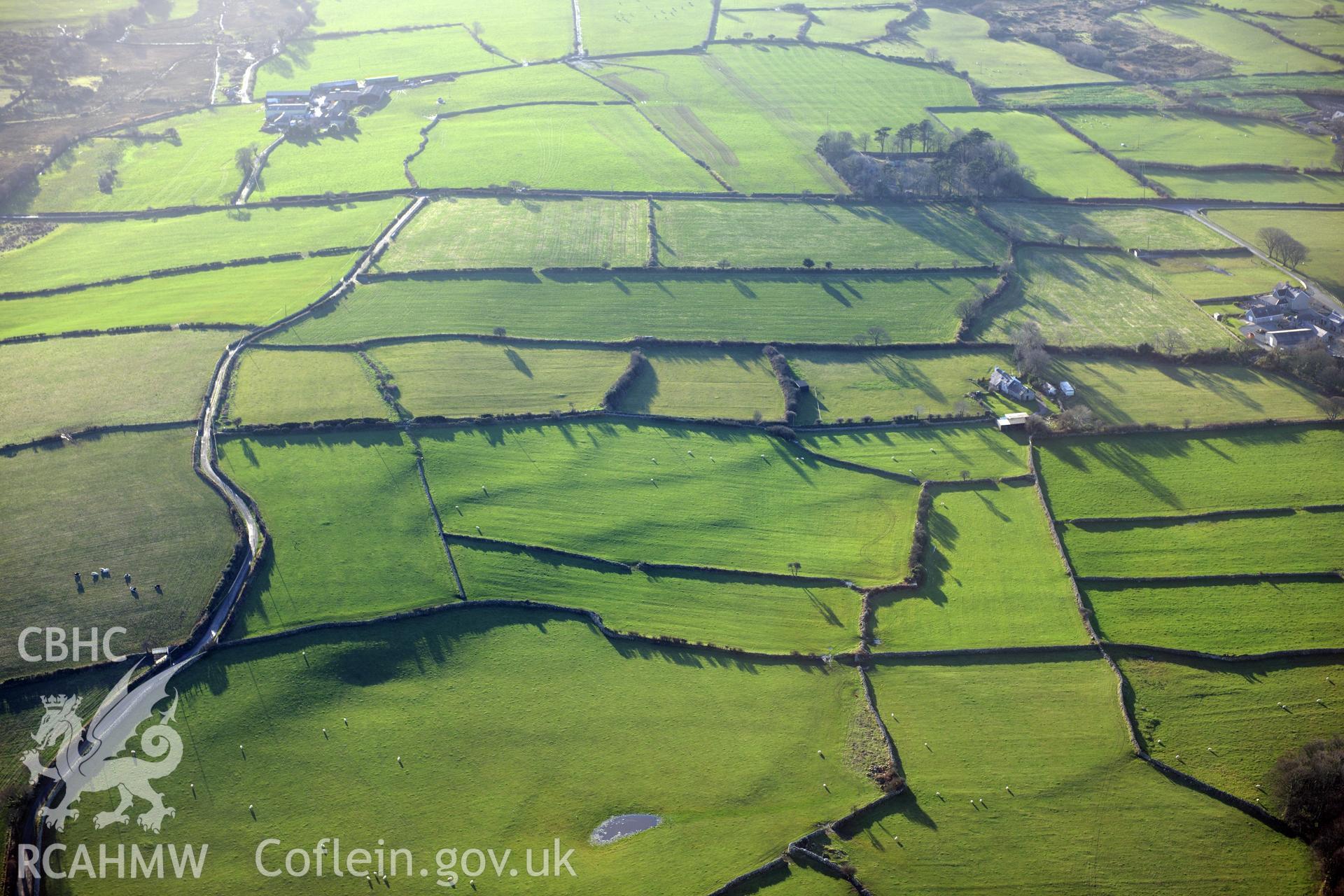 RCAHMW colour oblique photograph of Tyddyn Whisgin Bach early field system. Taken by Toby Driver on 10/12/2012.
