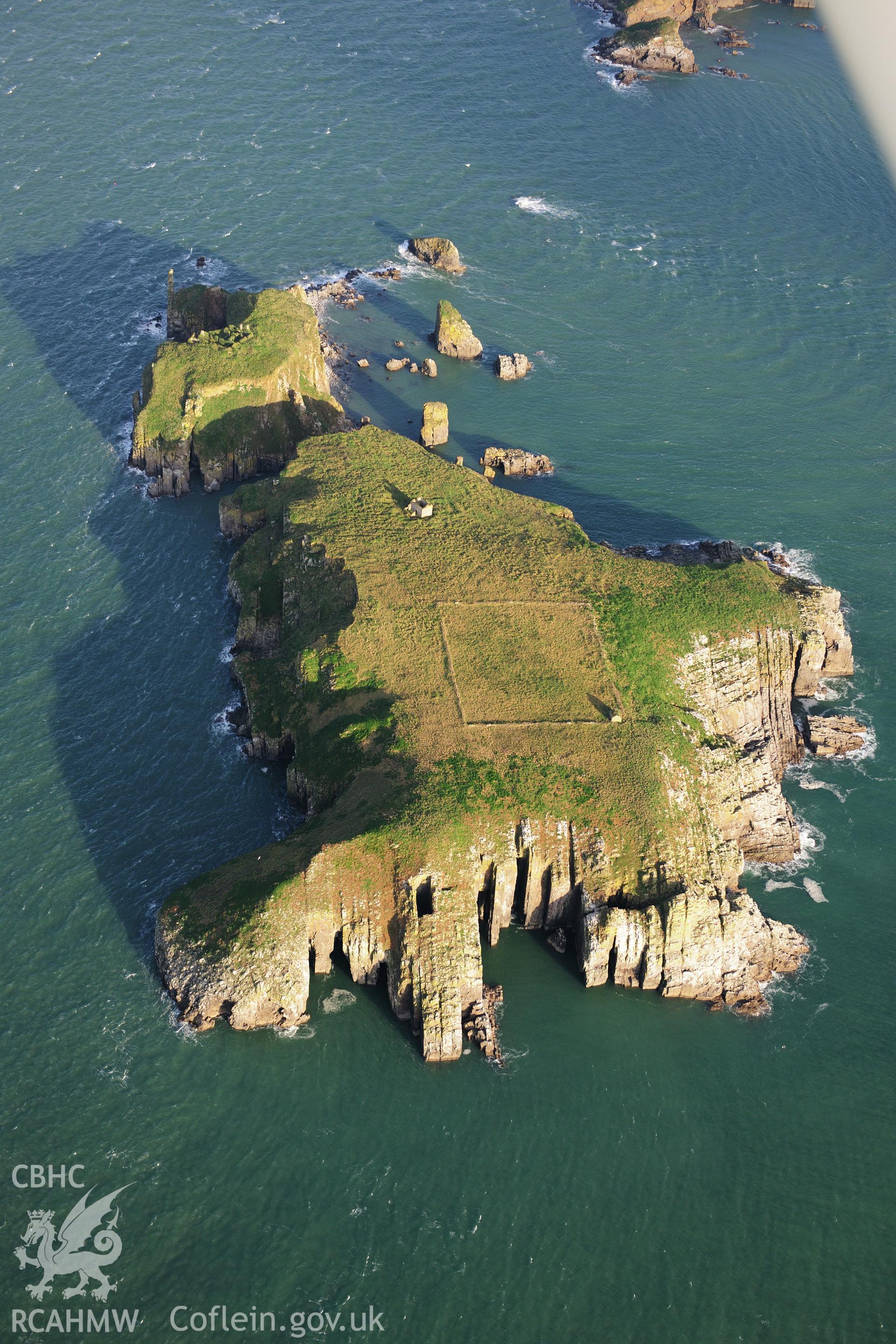 RCAHMW colour oblique photograph of Chapel ruins and field enclosure, St Margaret's Island. Taken by Toby Driver on 26/10/2012.