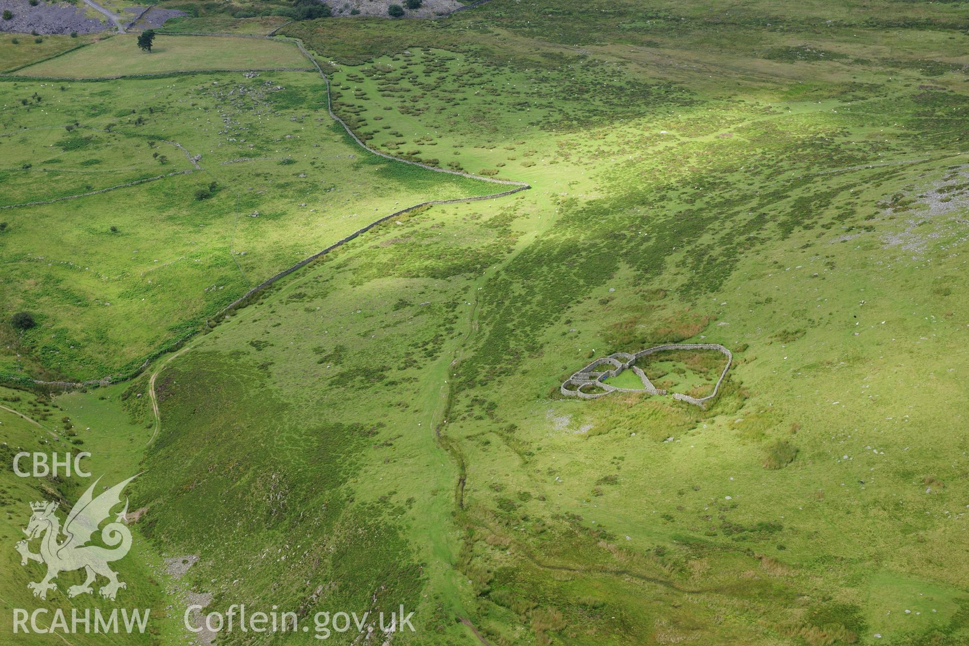 RCAHMW colour oblique photograph of sheepfold, Llefn, viewed from the south. Taken by Toby Driver on 10/08/2012.