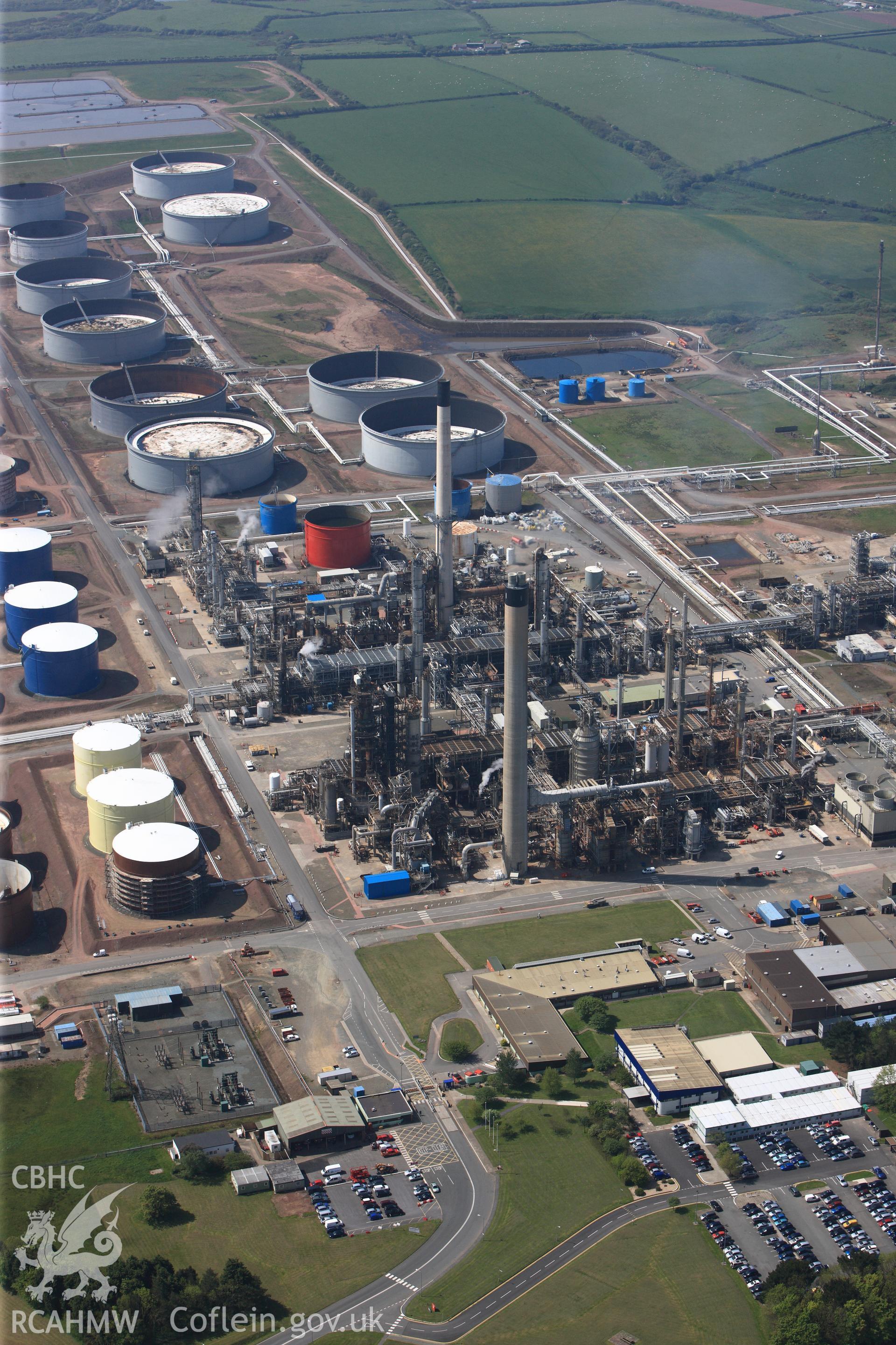 RCAHMW colour oblique photograph of General view of Amoco oil refinery, looking south west. Taken by Toby Driver on 24/05/2012.