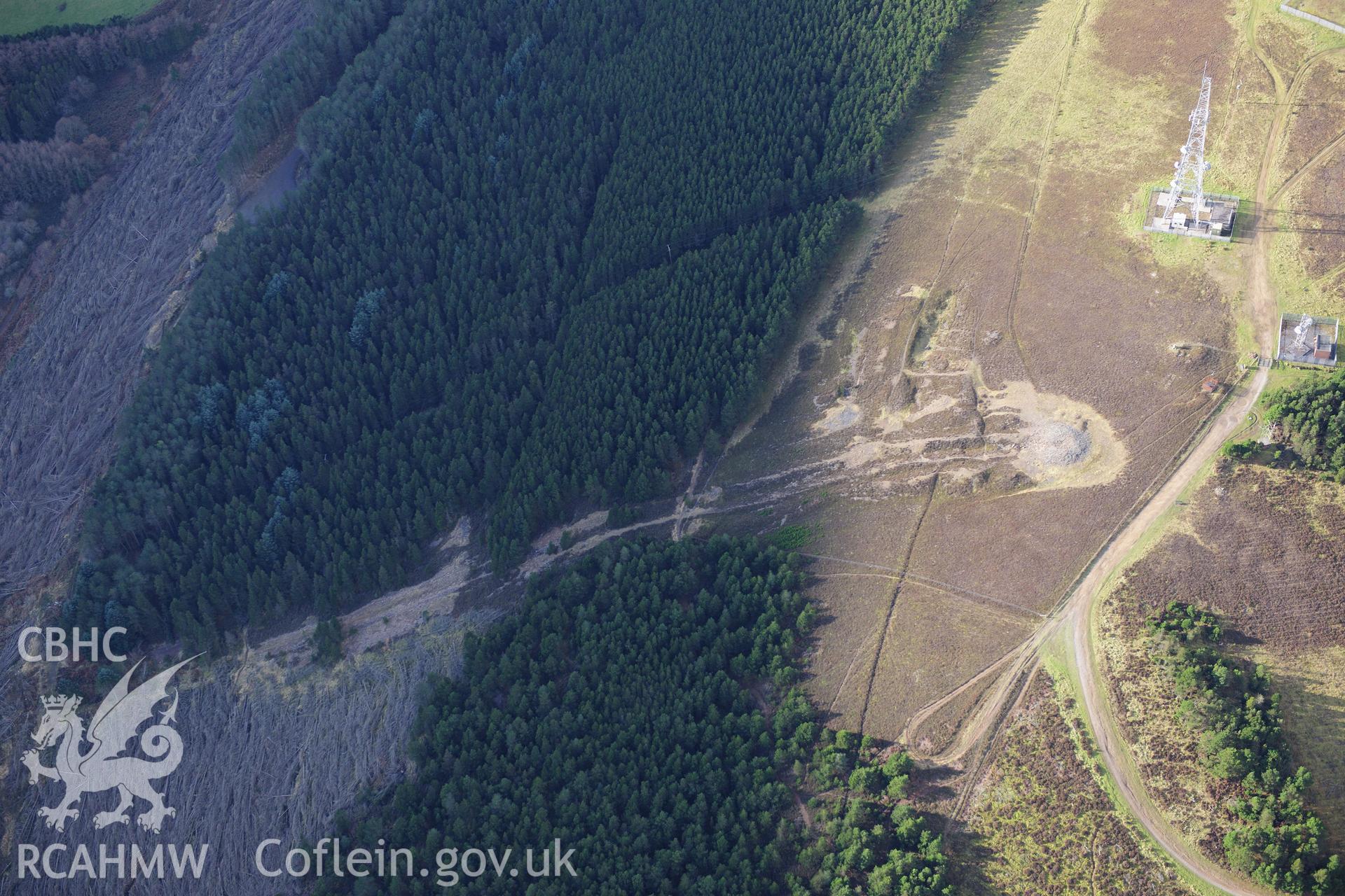 RCAHMW colour oblique photograph of Foel Fynyddau cairn, and Cwmafan Copper Works flue. Taken by Toby Driver on 28/11/2012.