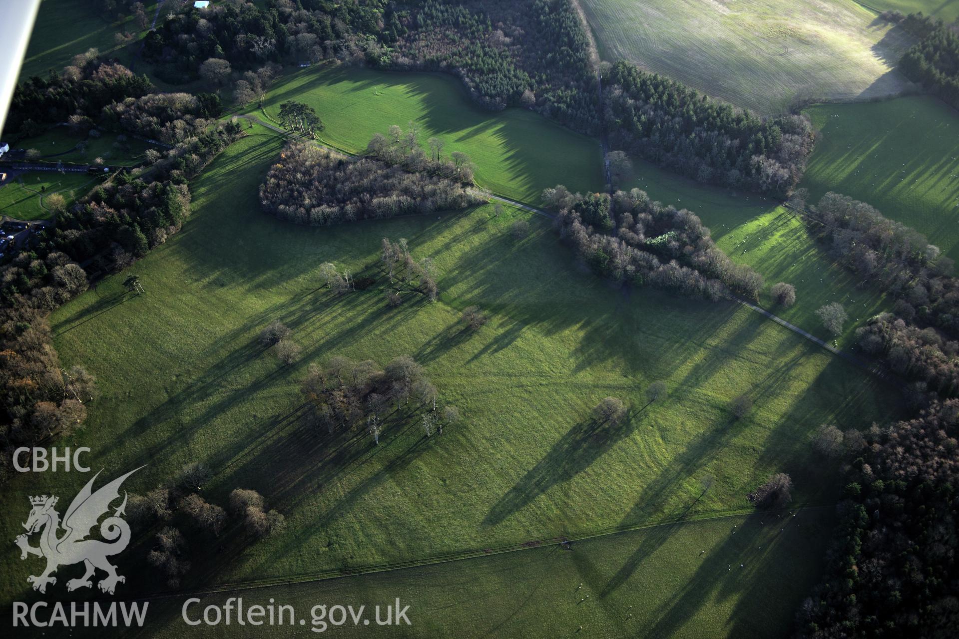 RCAHMW colour oblique photograph of Penrhyn Park earthworks, earthworks in north part of parkland. Taken by Toby Driver on 10/12/2012.