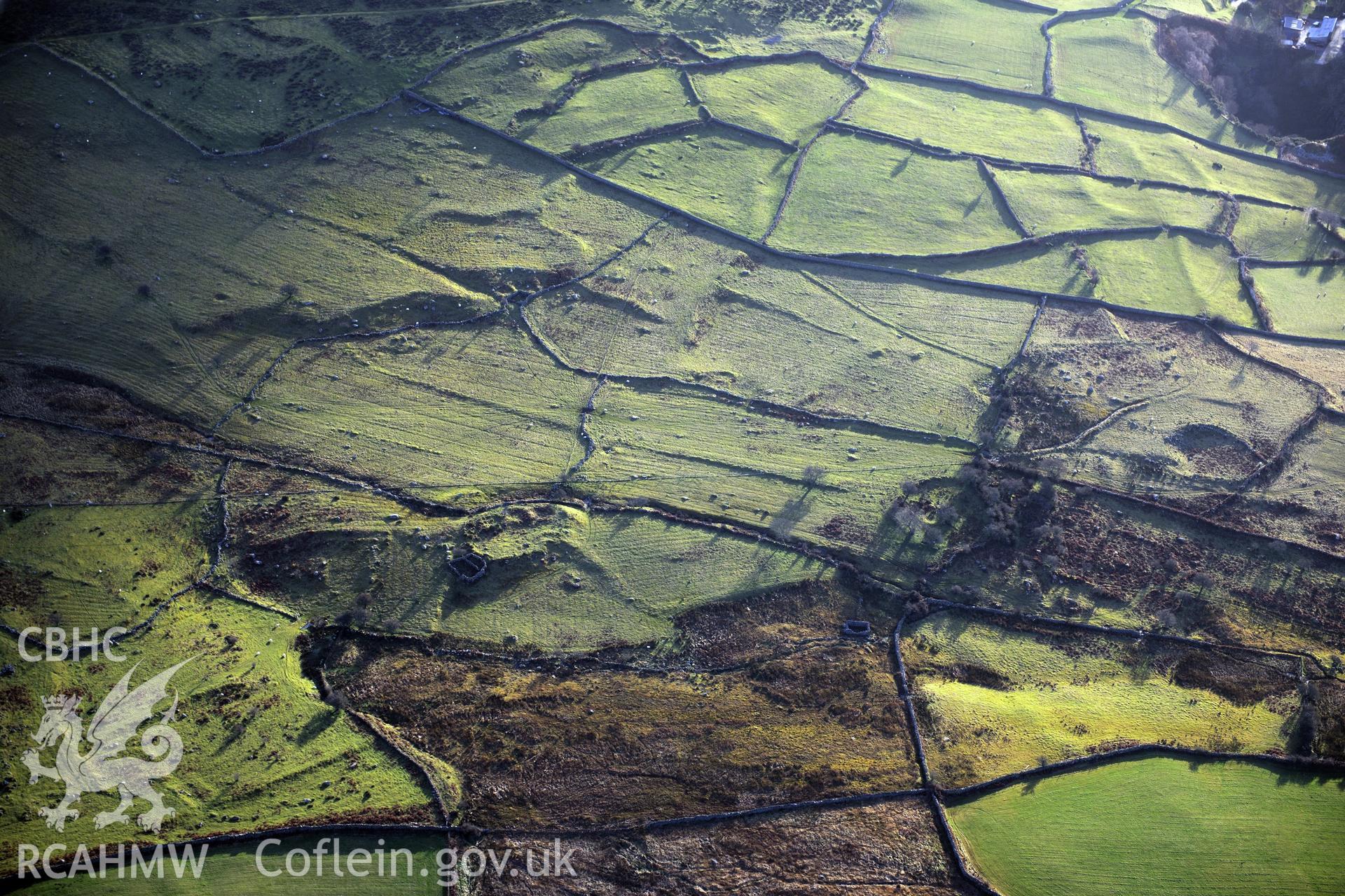 RCAHMW colour oblique photograph of Moel Faban early agricultural landscape, Llanllechid. Taken by Toby Driver on 10/12/2012.