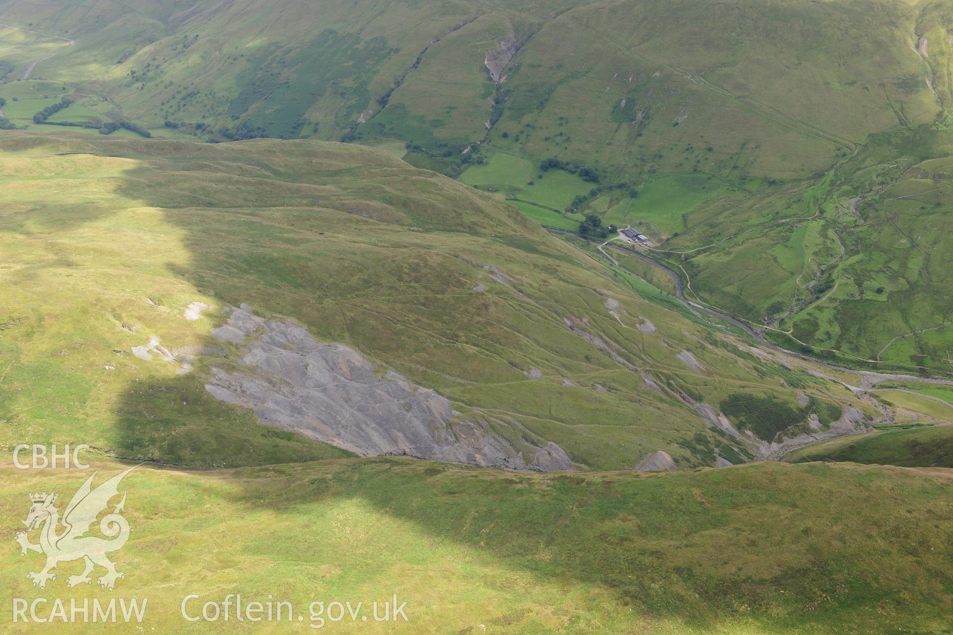 RCAHMW colour oblique photograph of Copa Hill, Cwmystwyth Lead, Copper and Zinc mines. Taken by Toby Driver on 27/07/2012.