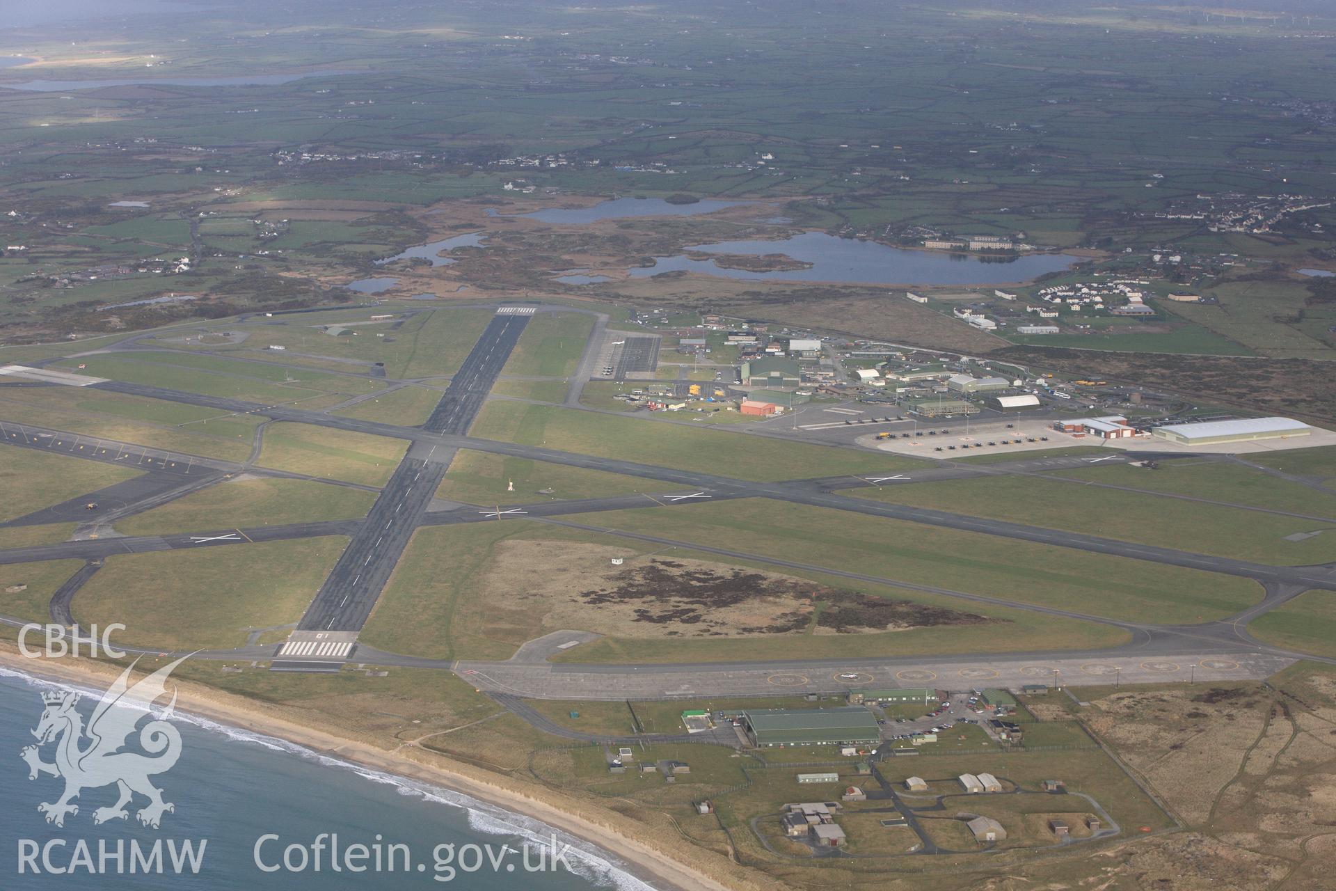 RCAHMW colour oblique photograph of RAF Valley, view from south-west. Taken by Toby Driver on 13/01/2012.