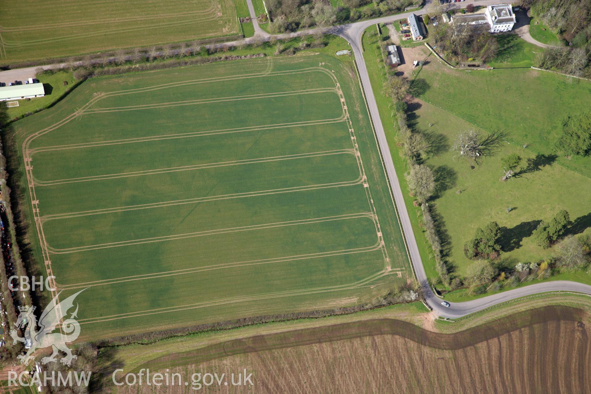 RCAHMW colour oblique photograph of Llancayo Farm barrow cemetery, southern cluster. Taken by Toby Driver and Oliver Davies on 28/03/2012.