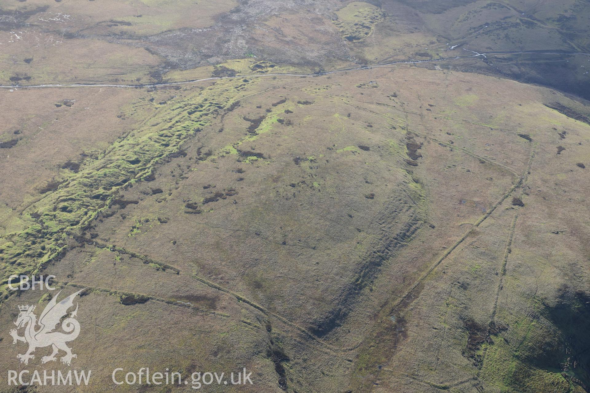 RCAHMW colour oblique photograph of Y Pigwn Roman camps. Taken by Toby Driver on 23/11/2012.