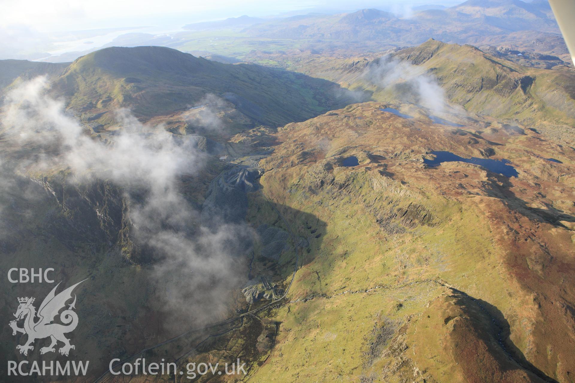 RCAHMW colour oblique photograph of Conglog slate quarry, looking west towards Rhosydd. Taken by Toby Driver on 13/01/2012.