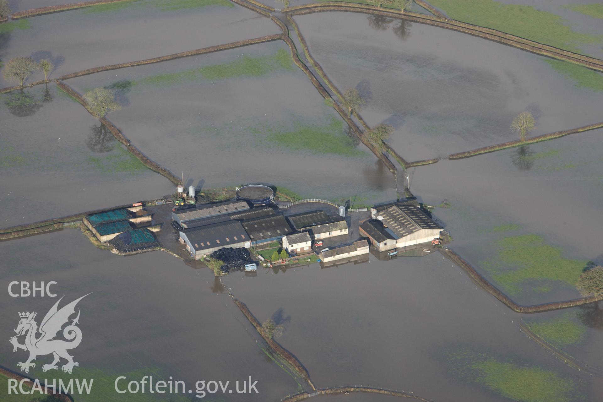 RCAHMW colour oblique photograph of Glantowy Fawr farm, with flooding, view from south. Taken by Toby Driver on 23/11/2012.