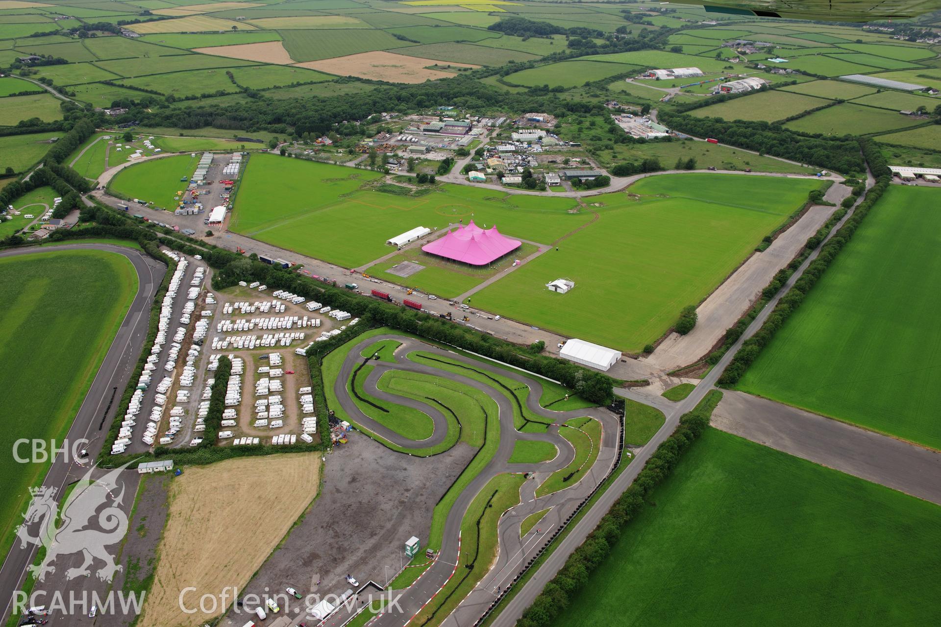 RCAHMW colour oblique photograph of Llandow Airfield 2012 National Eisteddfod. Taken by Toby Driver on 05/07/2012.