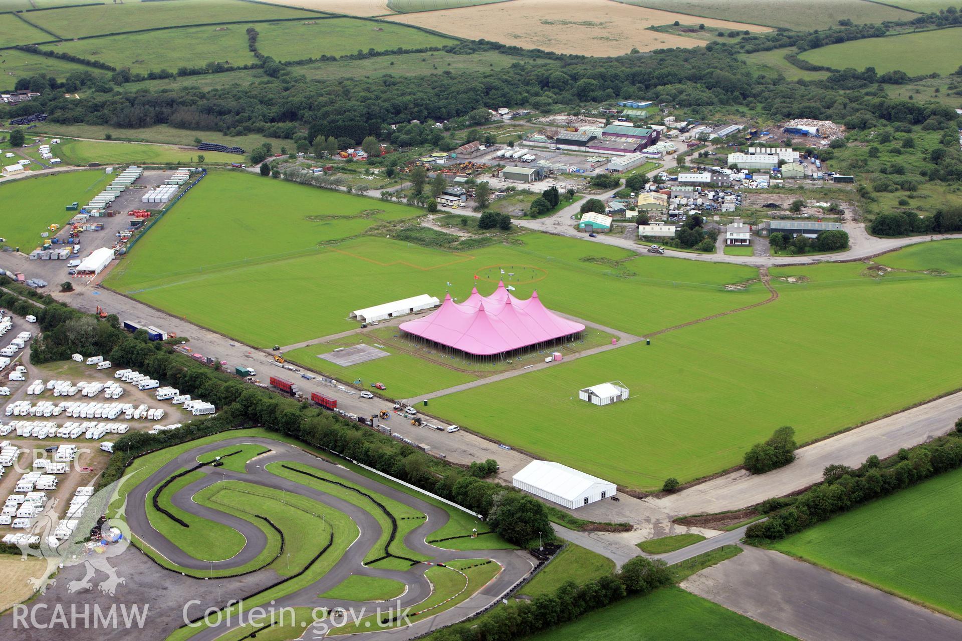 RCAHMW colour oblique photograph of Llandow Airfield 2012 National Eisteddfod. Taken by Toby Driver on 05/07/2012.