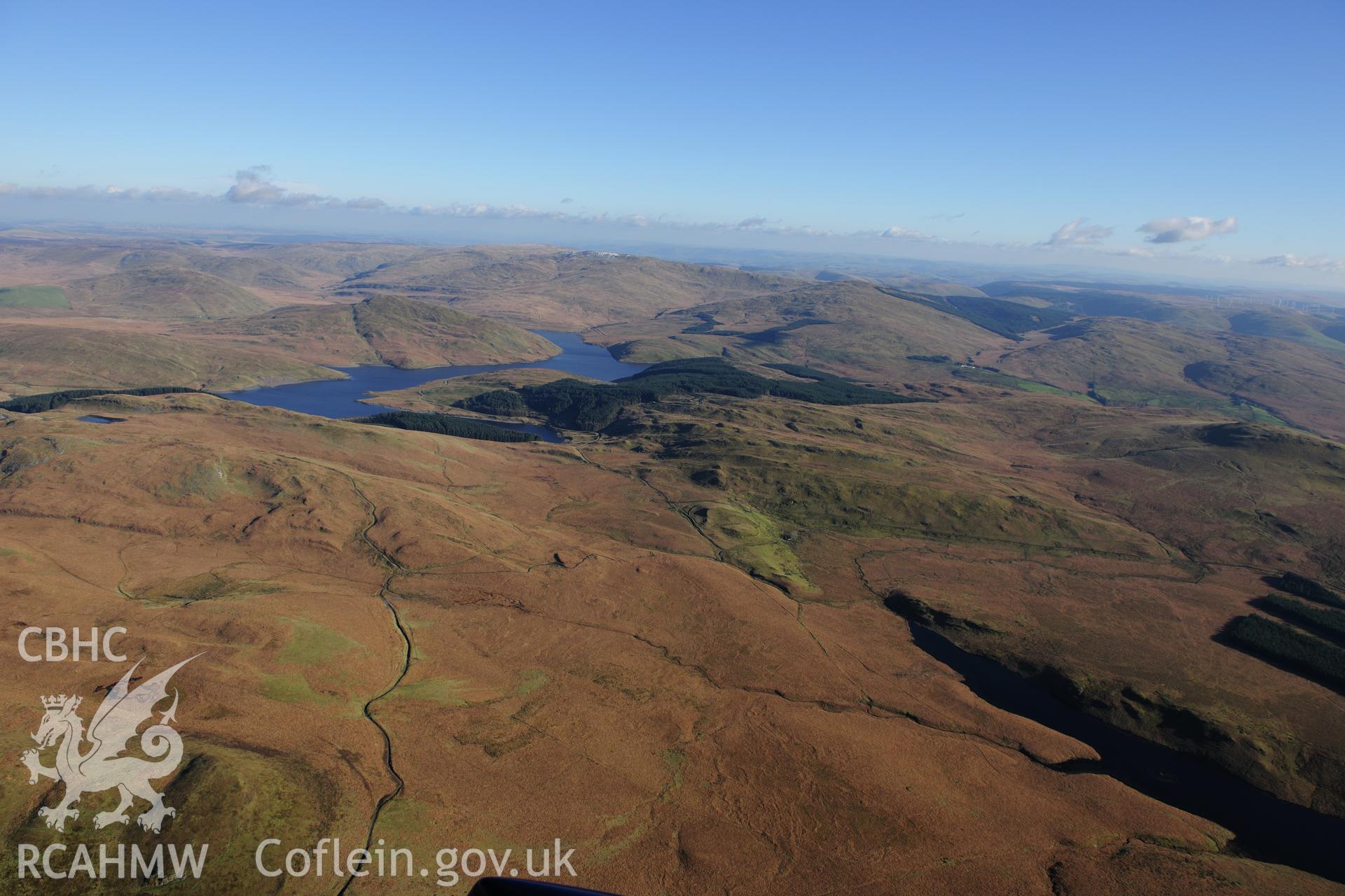 RCAHMW colour oblique photograph of Llyn Craigypistyll, upland landscape east of. Taken by Toby Driver on 05/11/2012.